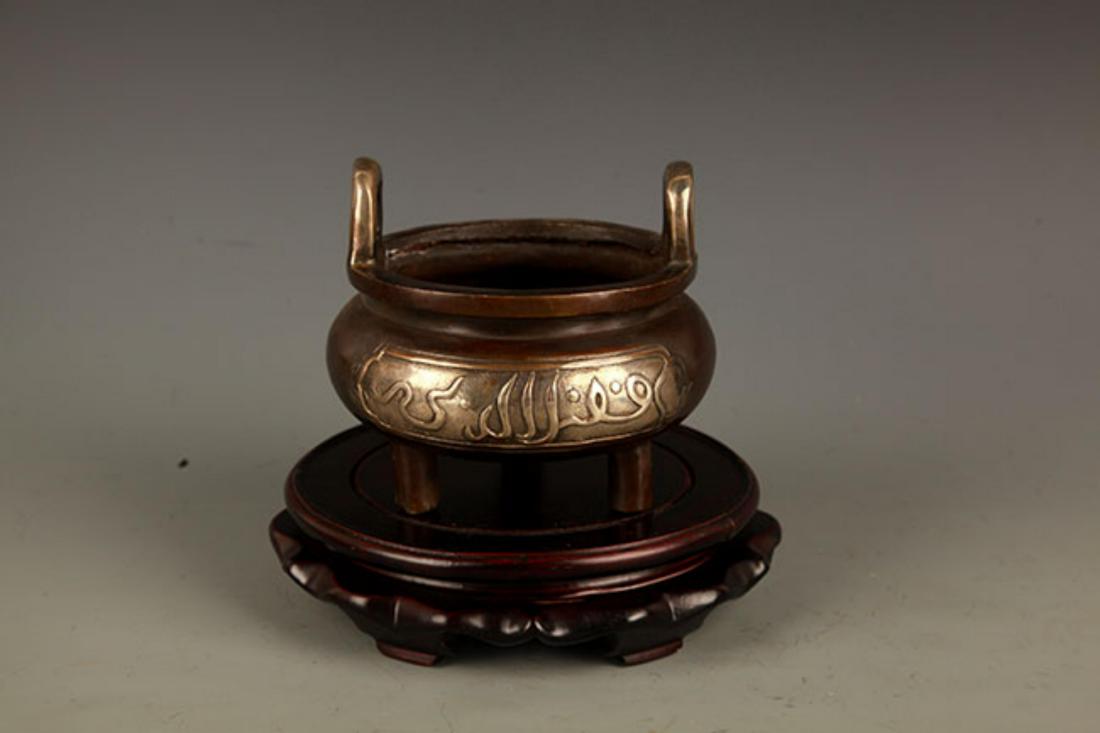 A DOUBLE EAR TRIPOD FOOT BRONZE CENSER: 20th Century, High: 4.5 inch; Diameter: 4.5 inch