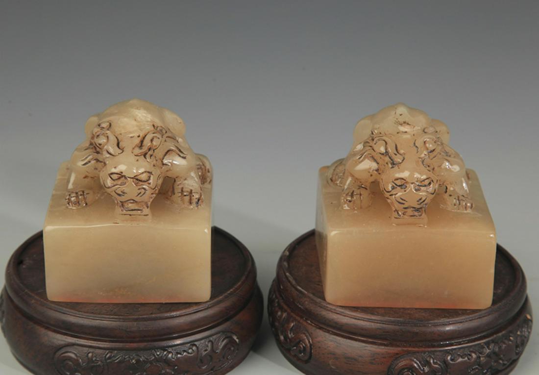 PAIR OF SOAPSTONE LION TOP SEAL: 20th Century, High: 2.0 inch; Width: 2.0 inch