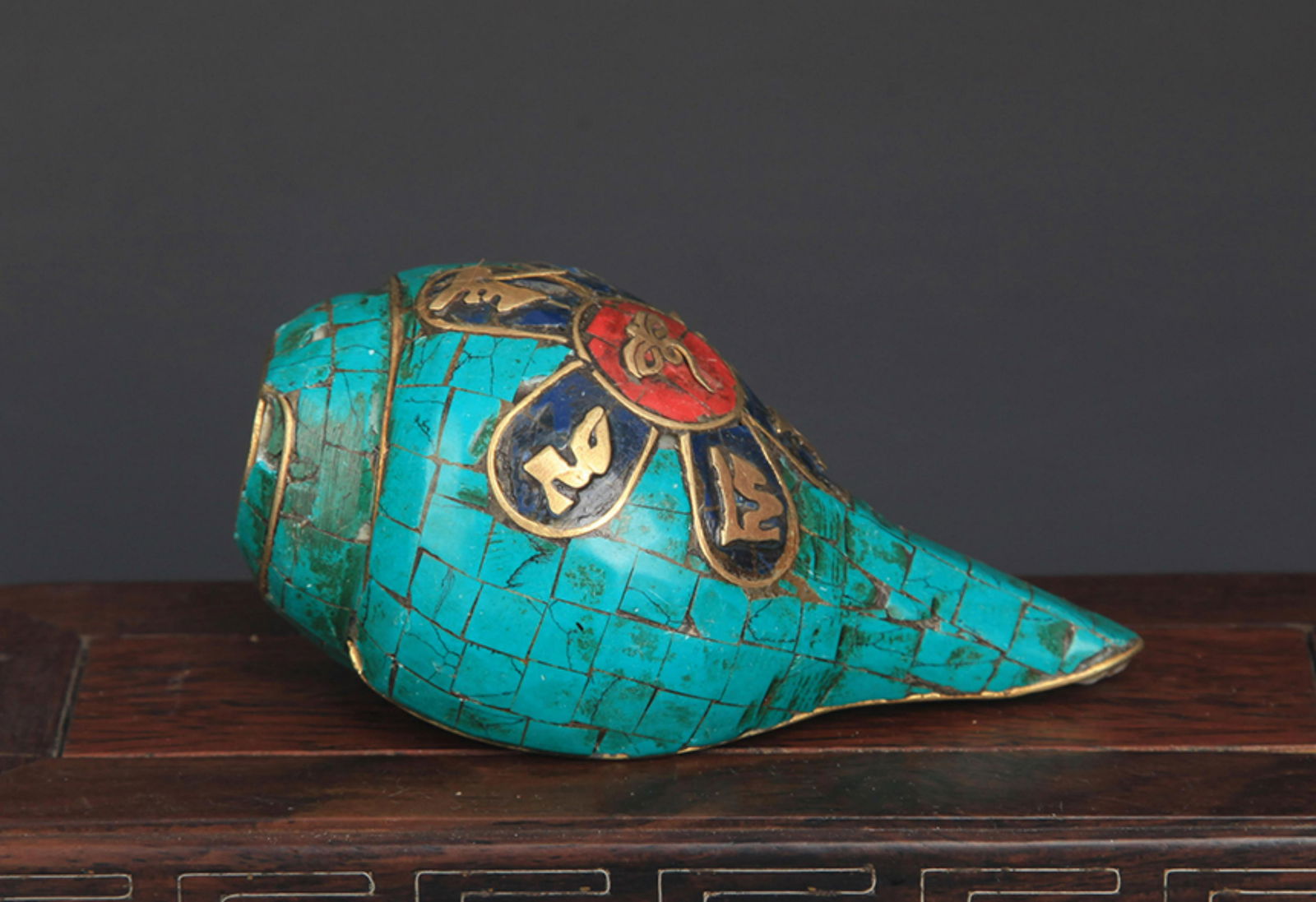A TIBETAN BUDDHISM CONCH WITH TURQUOISE (1 of 4)
