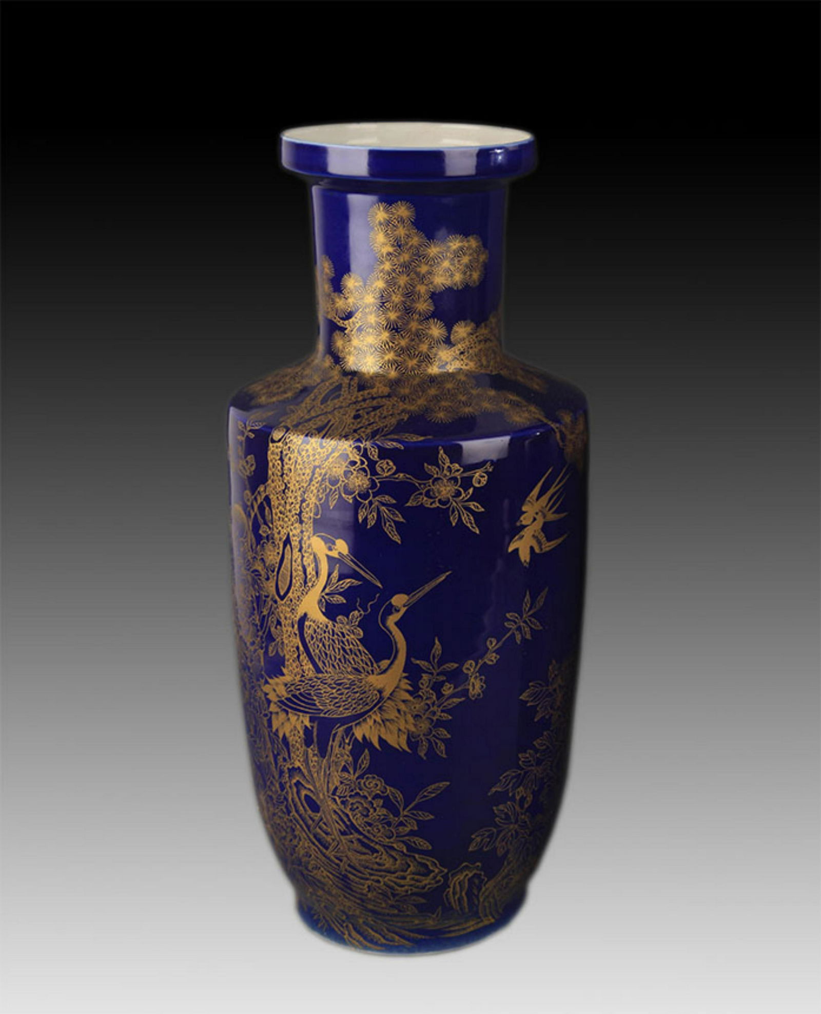 A DARK BLUE GLAZE AND GILT WOODEN CLUB STYLE VASE (1 of 10)