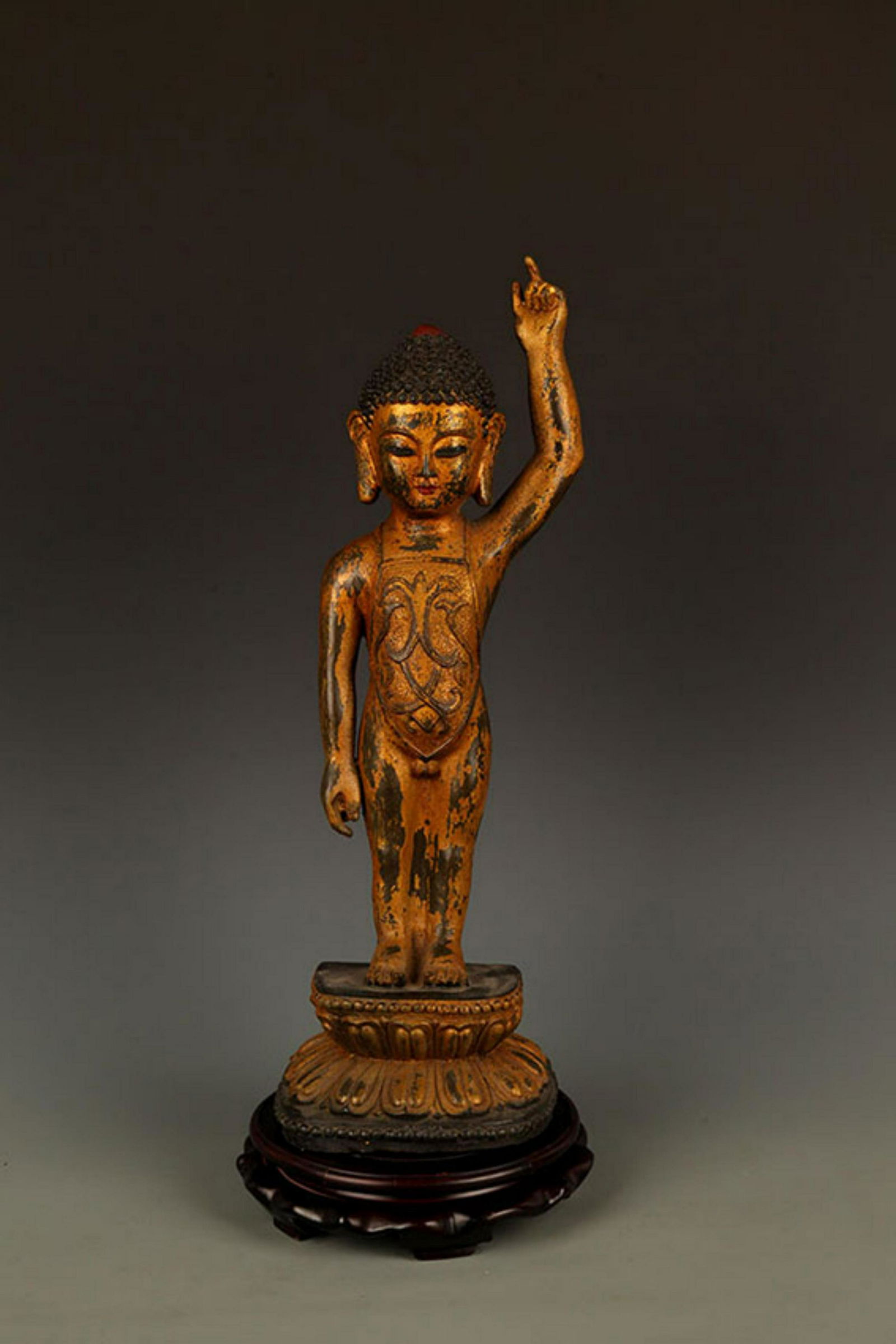 A TALL BRONZE BUDDHA FIGURE (1 of 8)