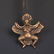 A SMALL BRONZE TIBETAN GARUDA FIGURE PENDANT