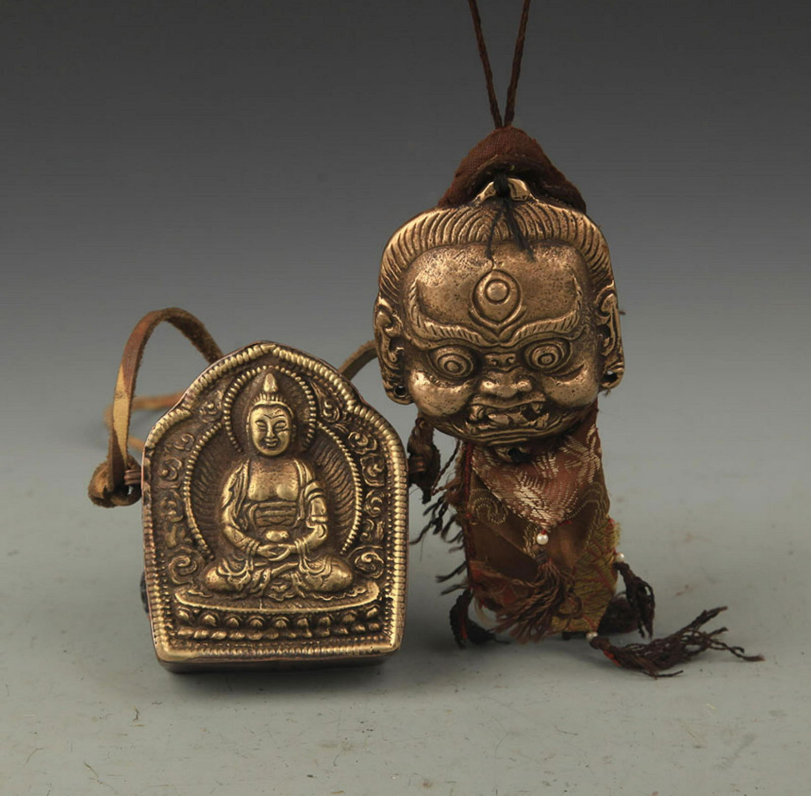 GROUP OF TWO TIBETAN BUDDHISM PENDANT (1 of 3)