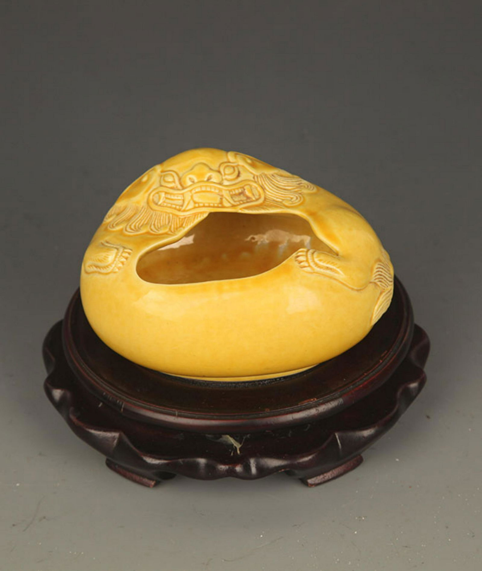 A YELLOW GLAZED LION FIGURE PORCELAIN WATER DROP (1 of 6)