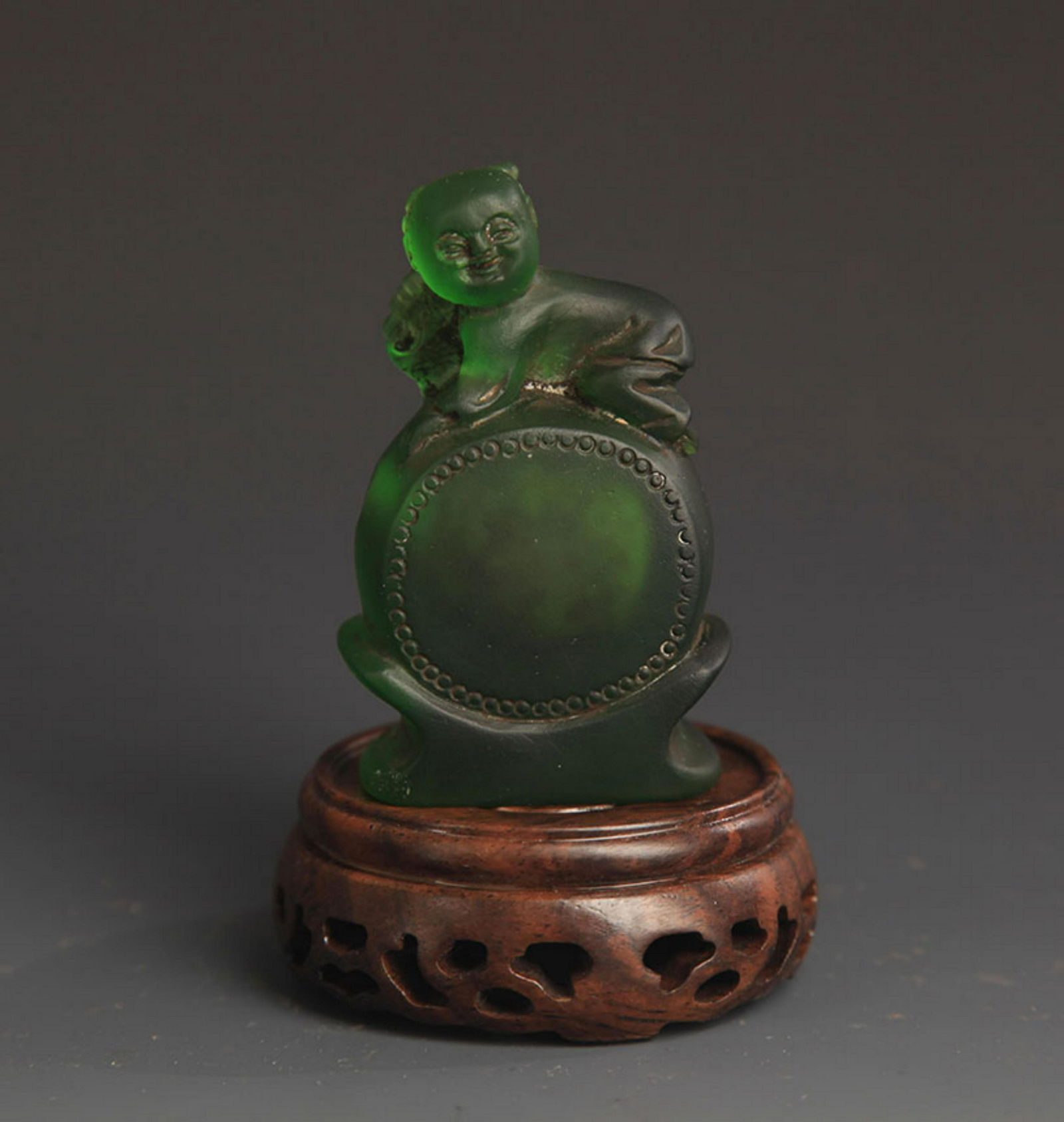 A FINE GLASS MADE BOY PLAYING SNUFF BOTTLE (1 of 4)