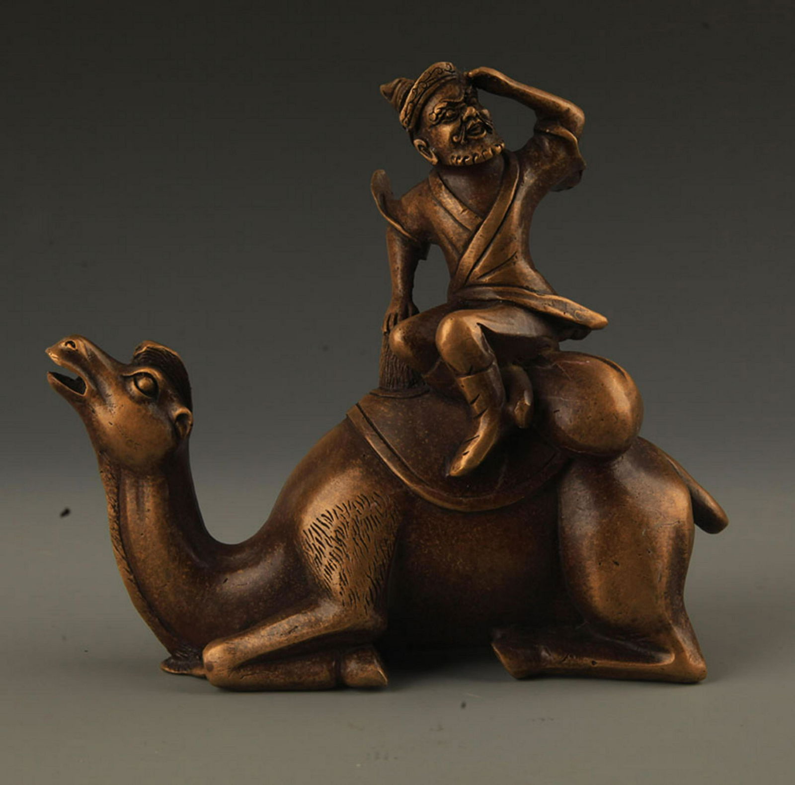 FINE BARBARIAN RIDING CAMEL BRONZE STATUE (1 of 3)