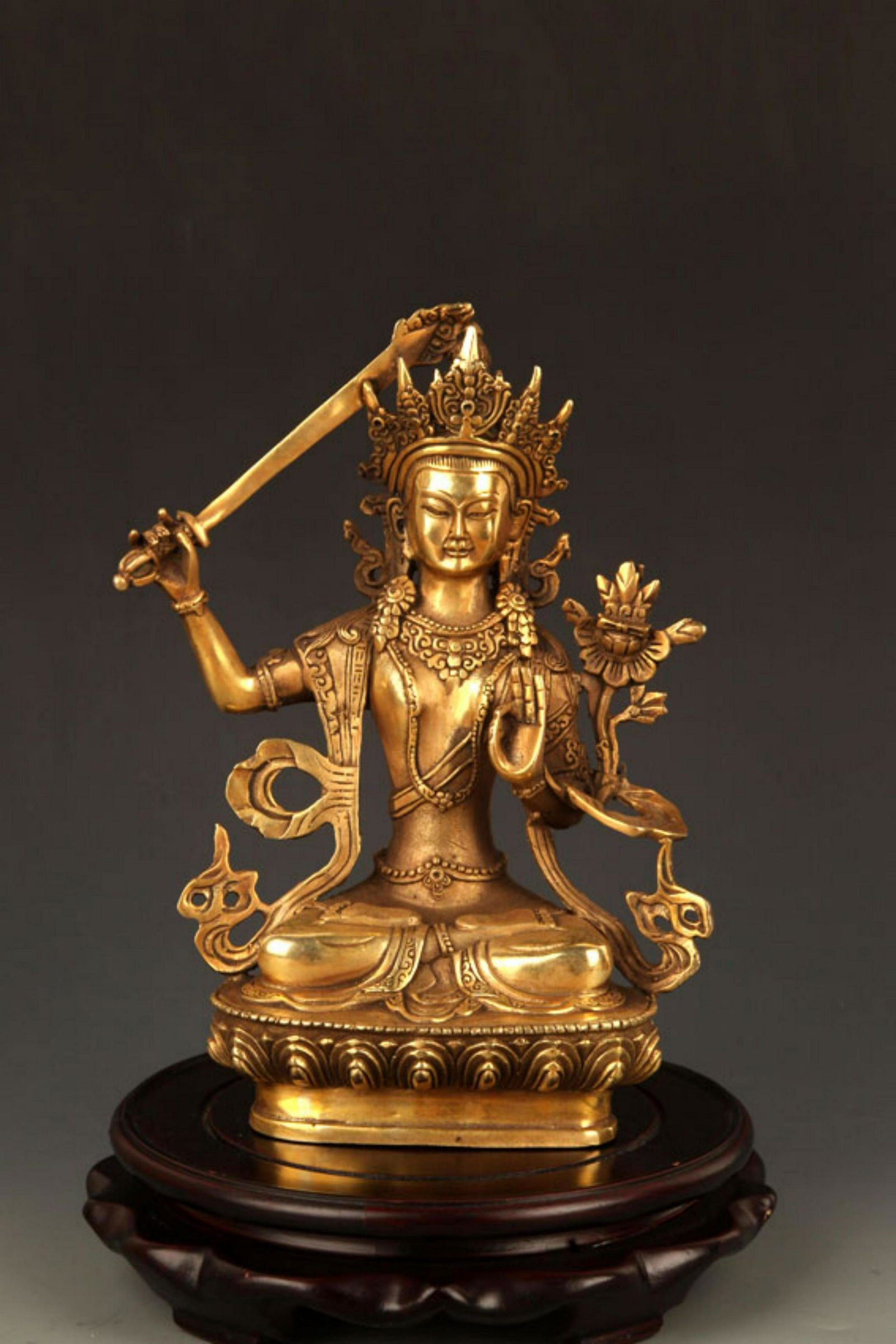 A BRONZE TIBETAN FIGURE OF MANJUSRI BODHISATTVA (1 of 9)