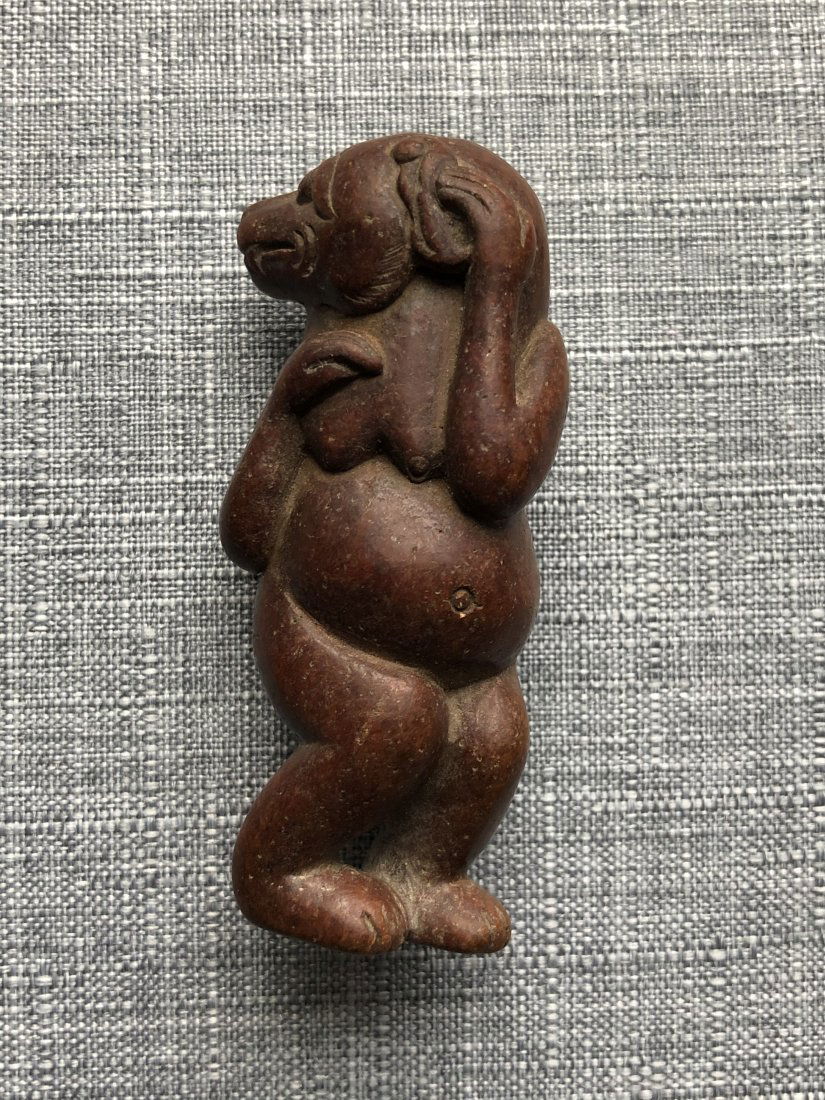 A RARE RUI SHOU SHAPED JADE (1 of 6)