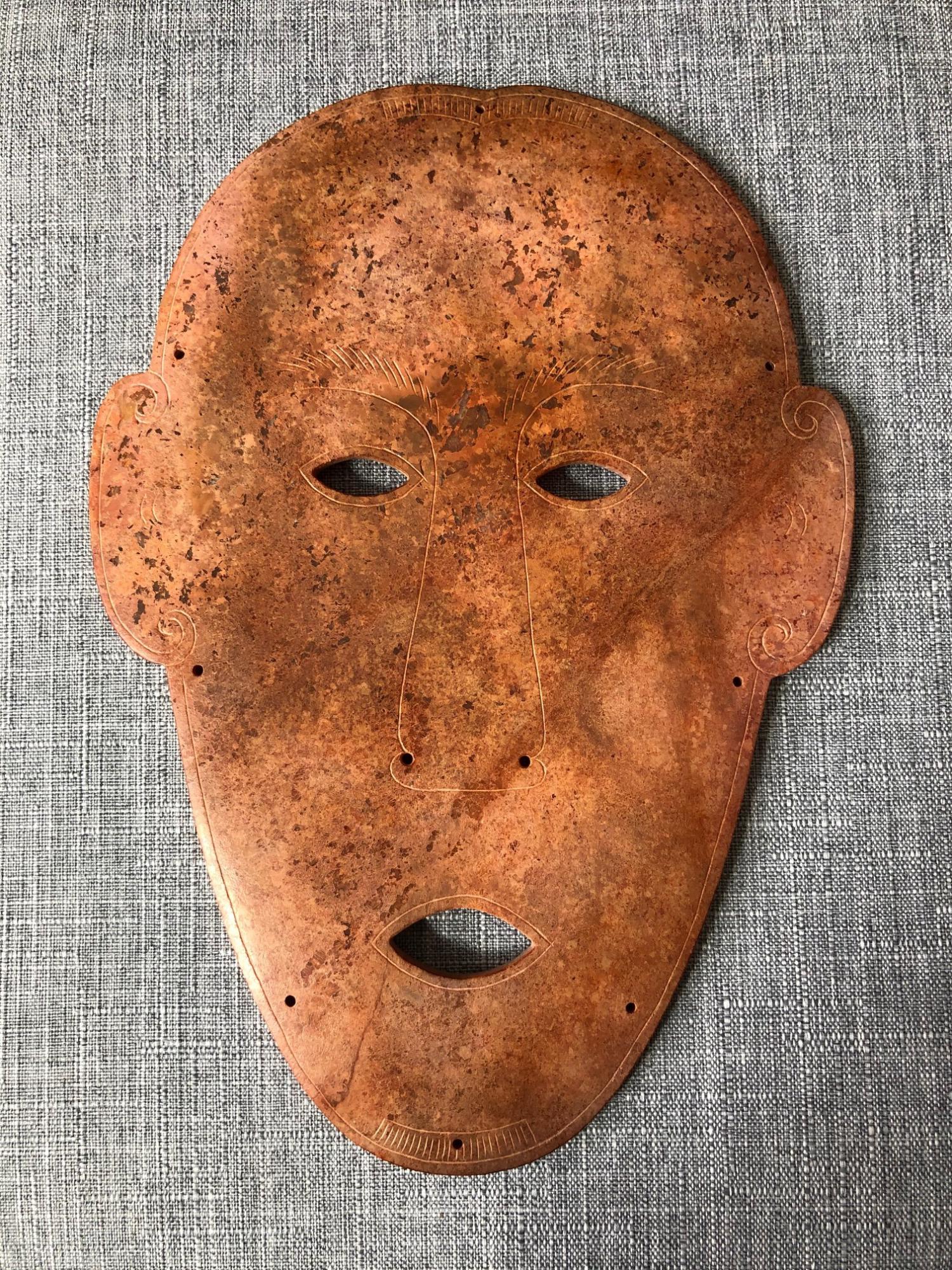 A RARE HUMAN FACE STYLE JADE MASK (1 of 5)