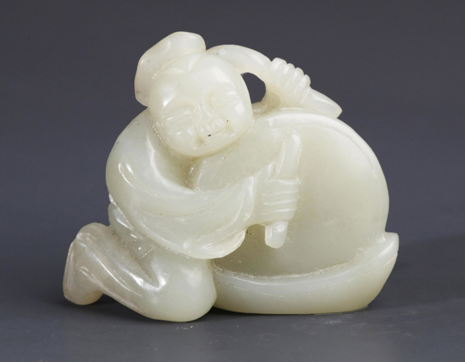 A HETIAN BOY PLAYING FIGURE JADE (1 of 5)