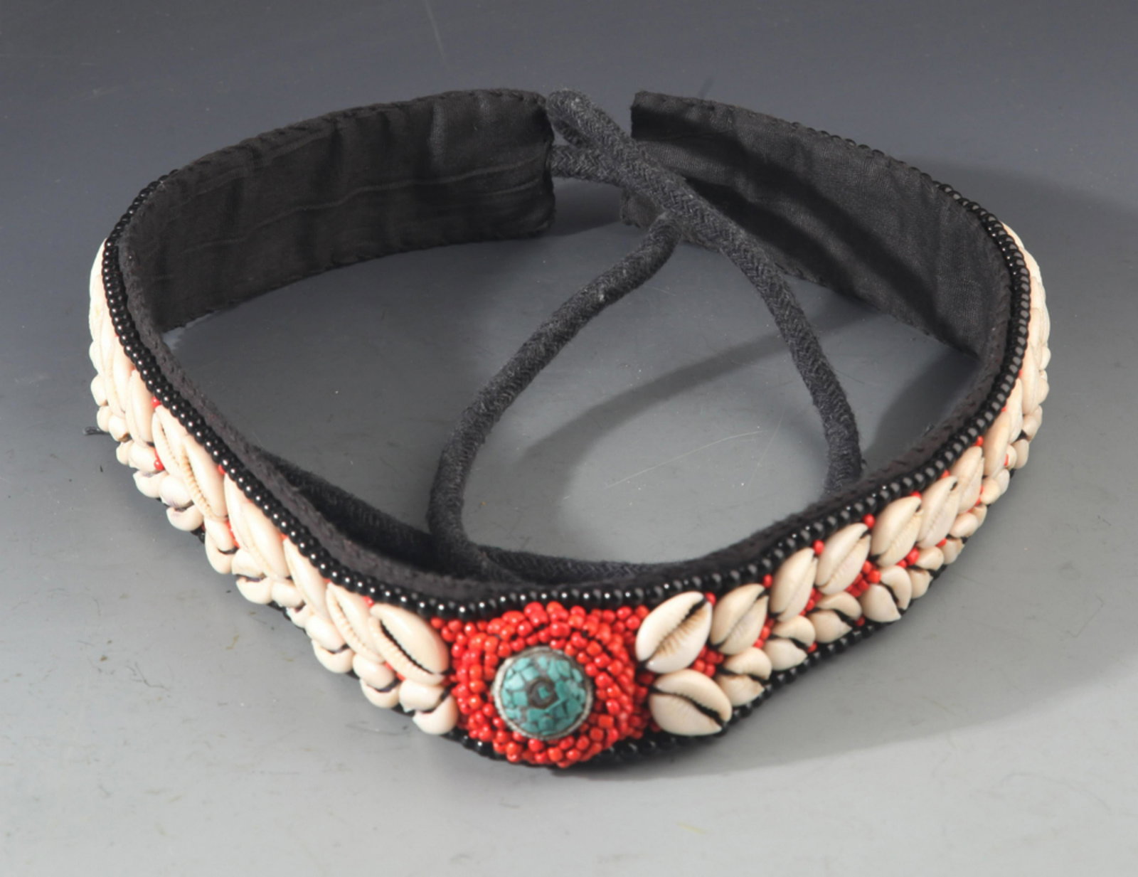 A FINE CORAL WITH SEA SHEEL HEADBAND: 20th Century, Long:26.8in; Width:1.6in