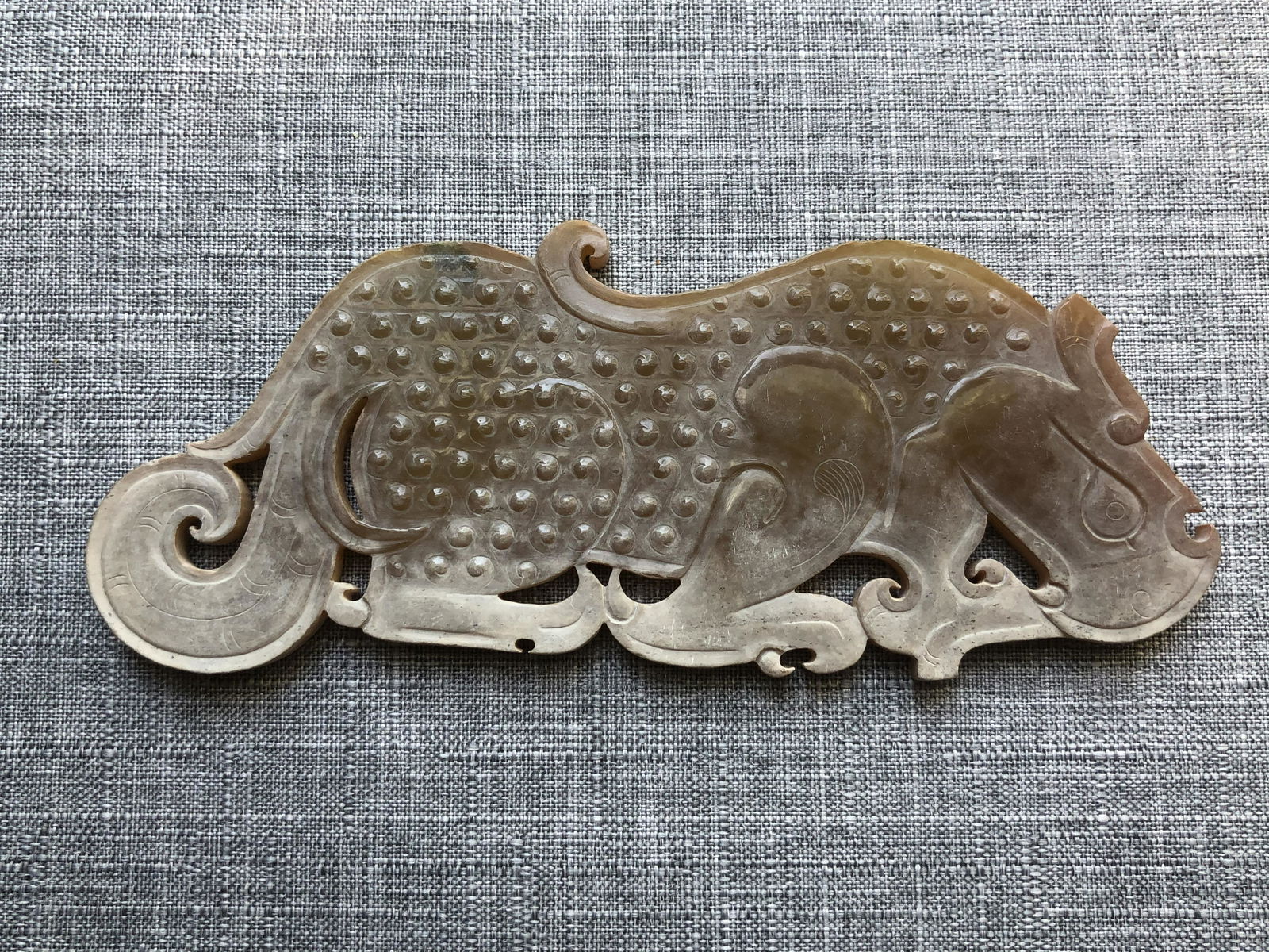 A RARE WARRING STATE TIGER SHAPED JADE (1 of 4)
