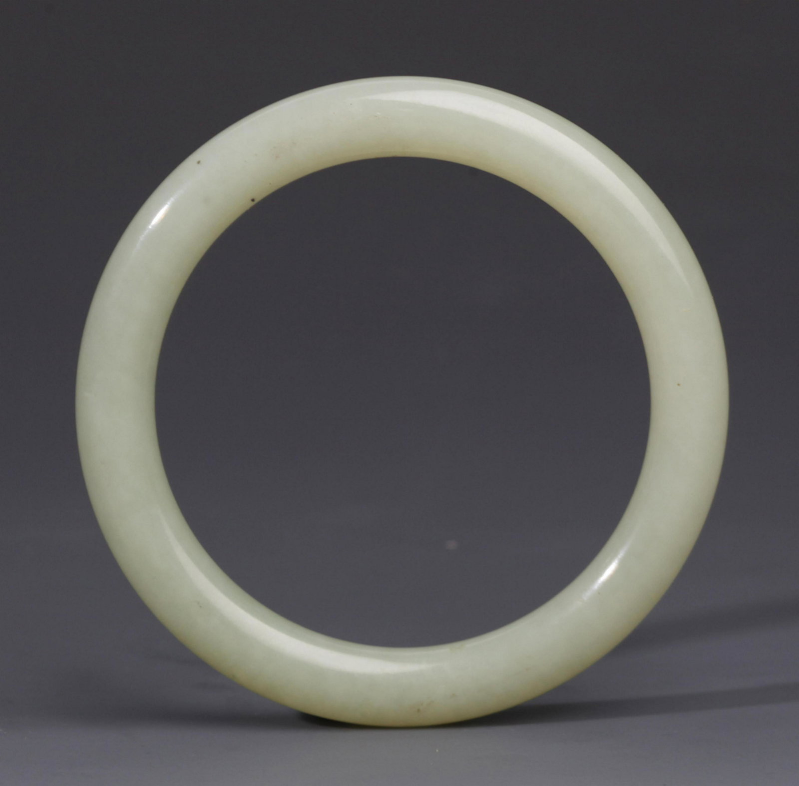 A FINE HETIAN PALE CELADON JADE BANGLE (1 of 6)