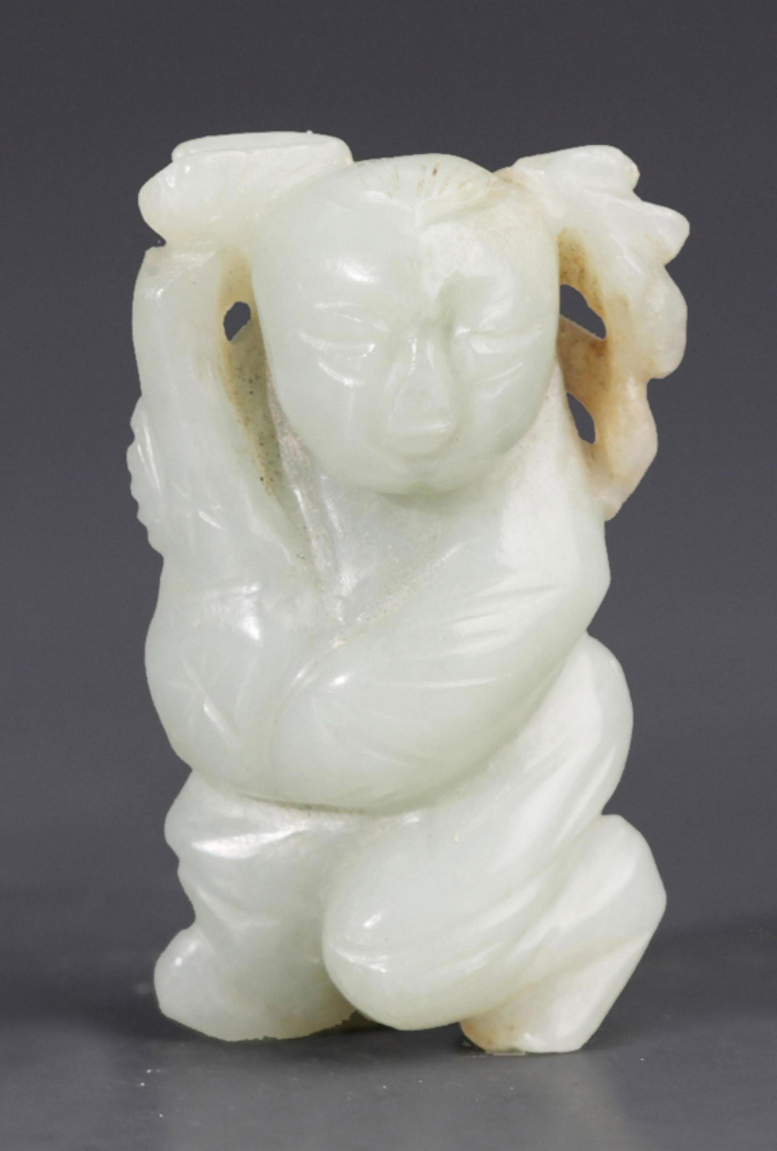 A FINE PALE CELADON JADE BOY FIGURE PENDANT (1 of 3)