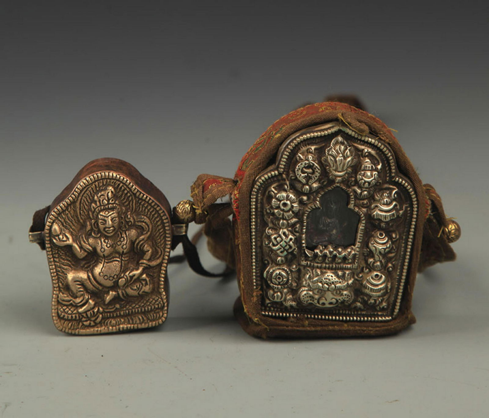 GROUP OF TWO TIBETAN BUDDHIST GAWU PENDANT (1 of 4)
