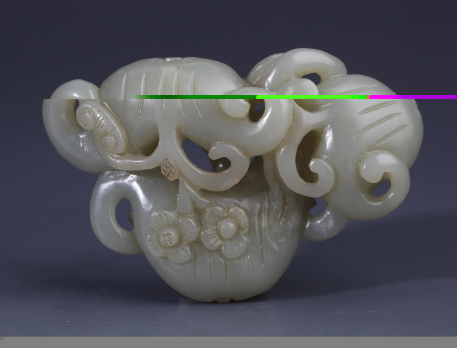 A FINELY FLOWER CARVING HETIAN GREENISH WHITE JADE: Qing Dynasty, Long: 2.36 inch; Width: 3.54 inch