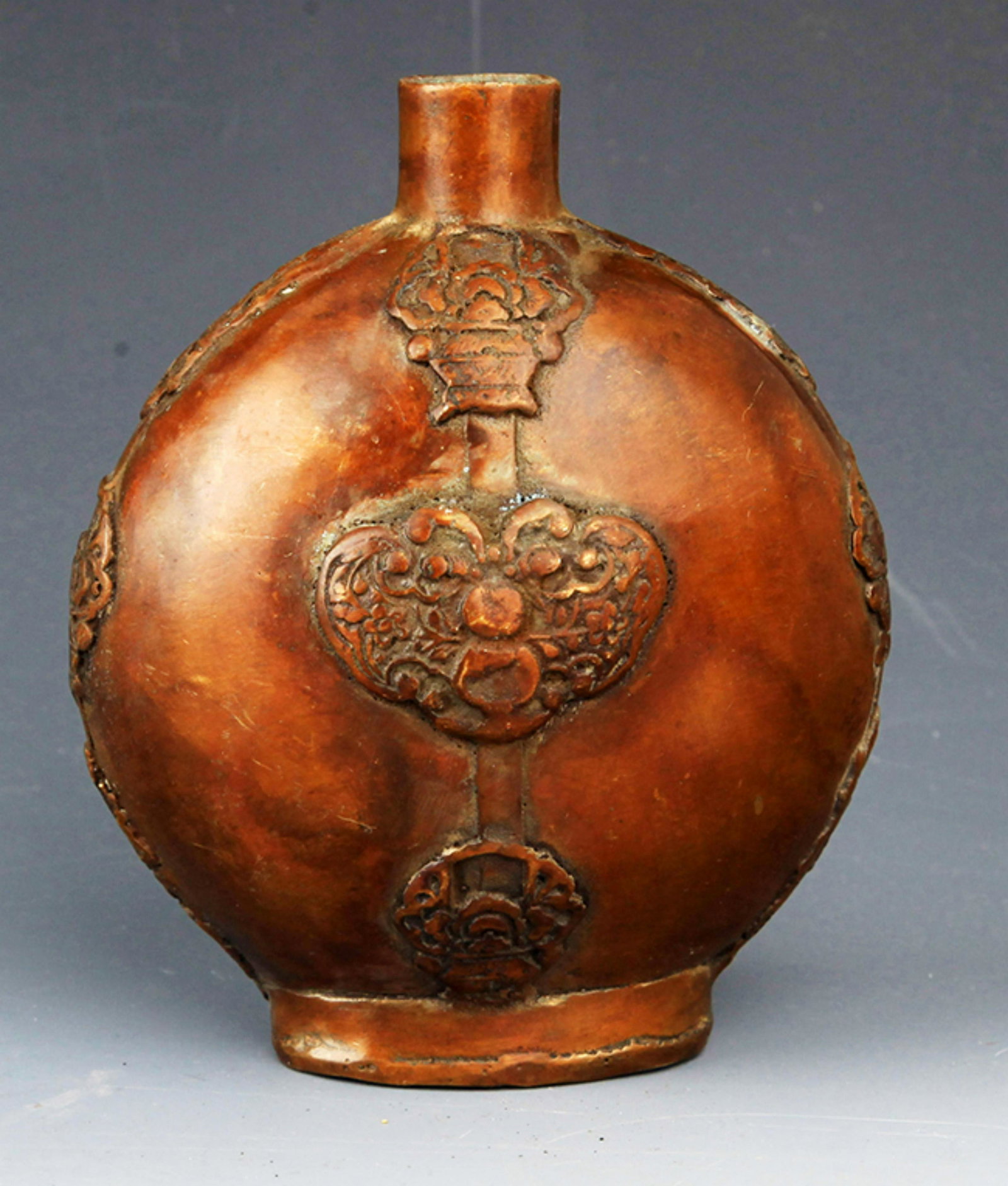 A FINE ROUND BRONZE WINE BOTTLE: 20th Century, High: 5.2 inch; Width: 4.5 inch
