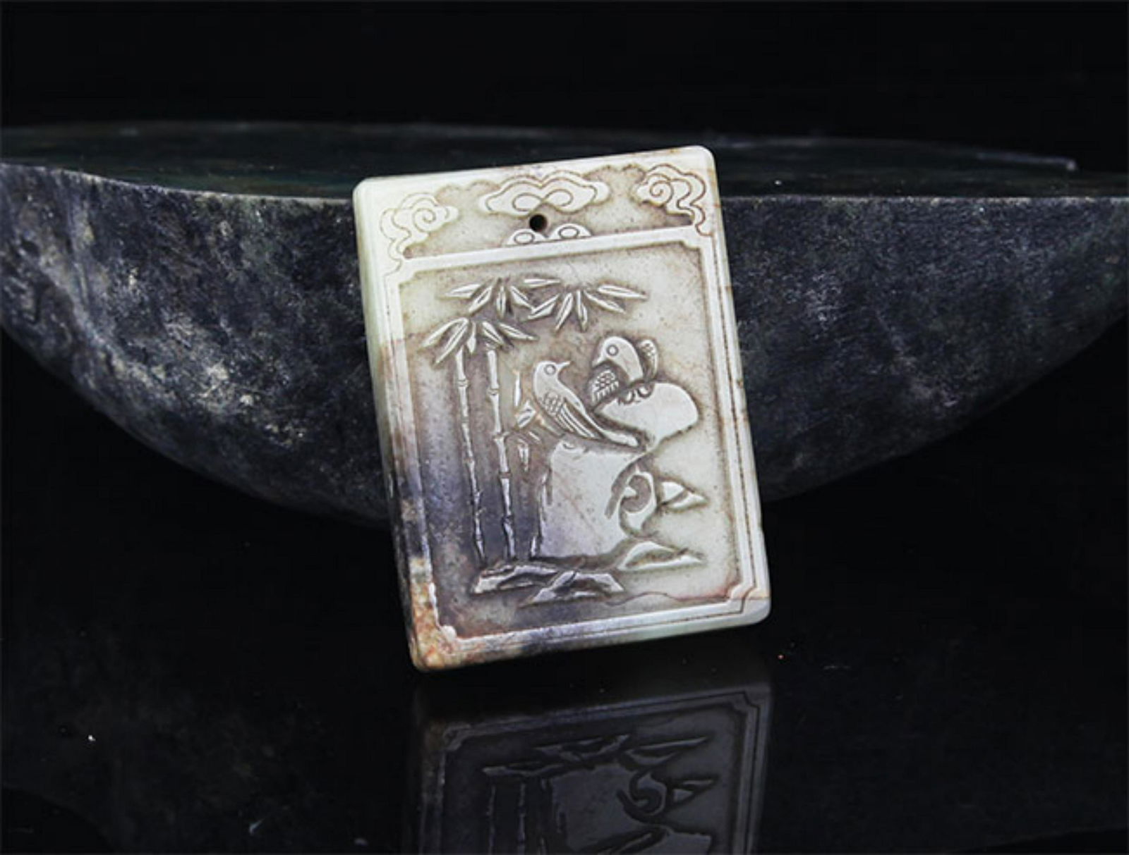 A FINE BIRD PATTERN PALE CELADON JADE (1 of 2)