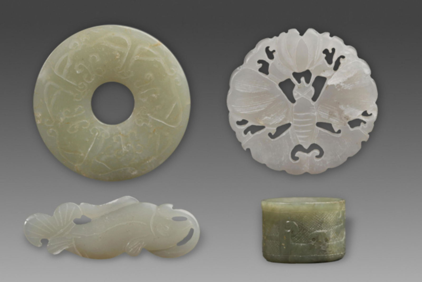 A FINE PALE CELADON JADE FISH FIGURE PENDANT (1 of 5)