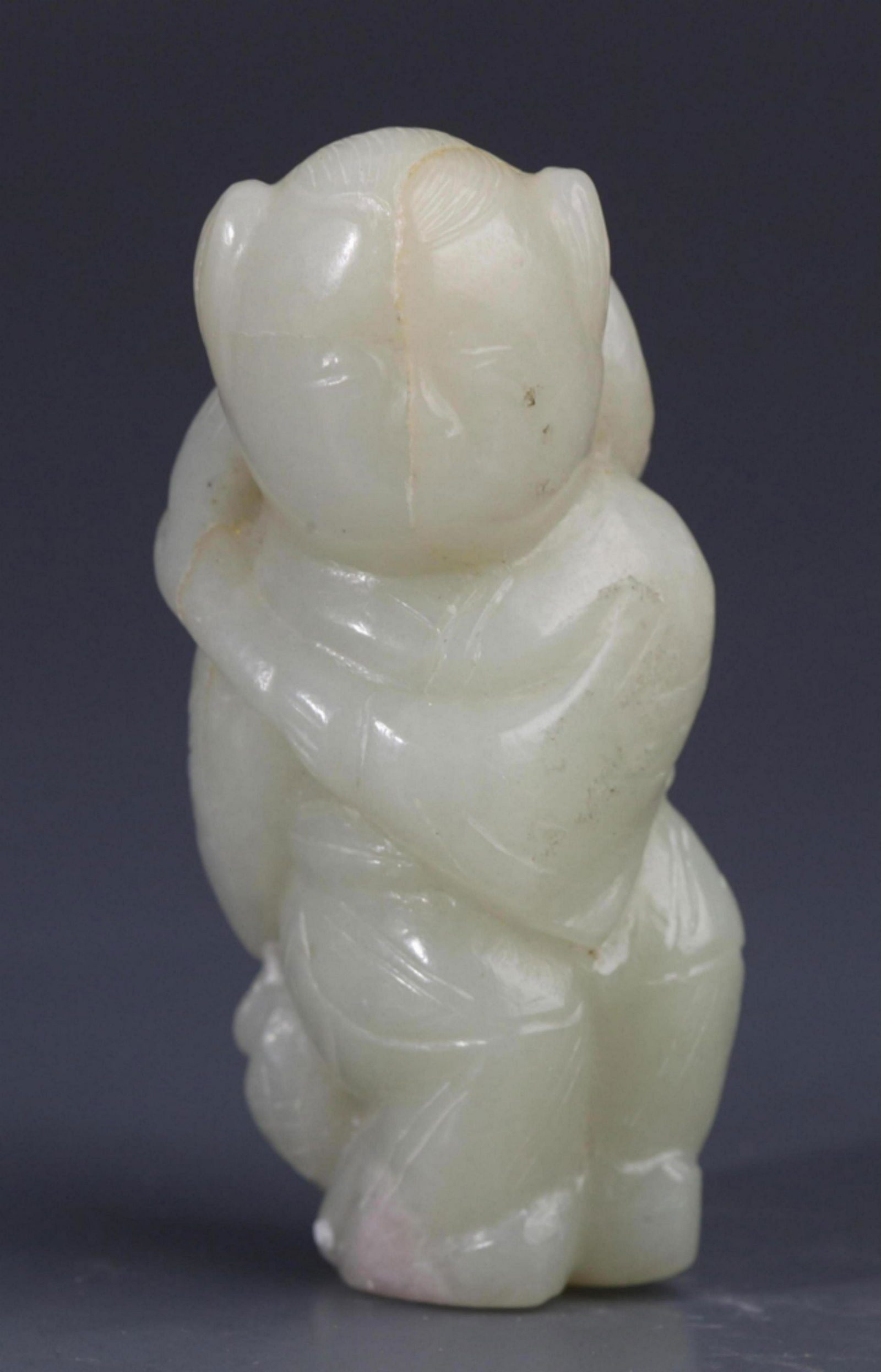 A FINE BOY WITH LOTUS PALE CELADON JADE PENDANT (1 of 3)