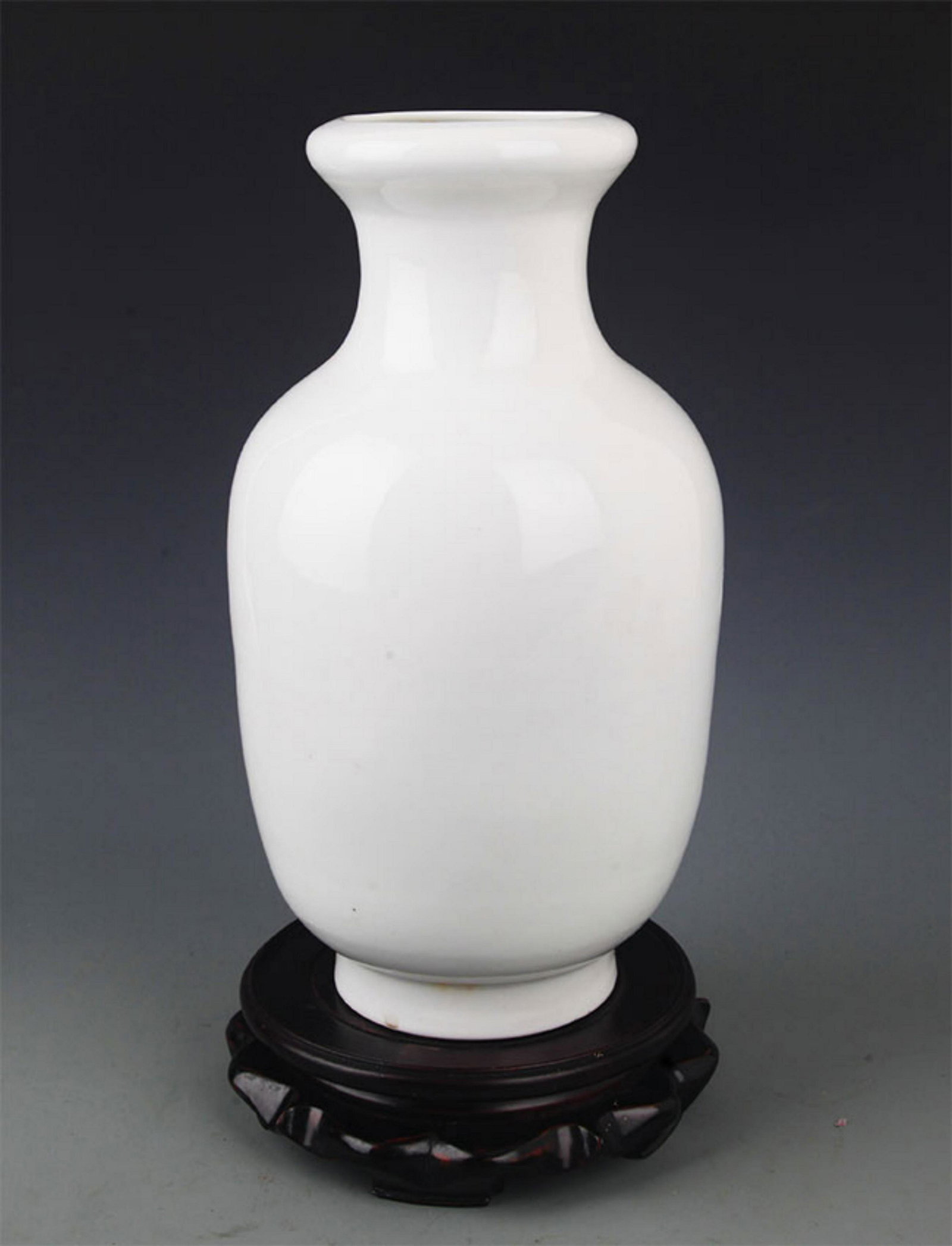 A WHITE COLOR GLAZED PORCELAIN BOTTLE: Ming Dynasty Style, High: 11.75 inch; Diameter:3.5 inch
