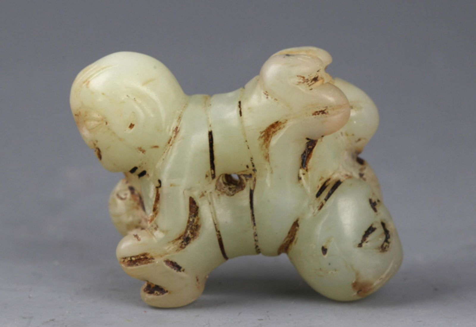 A FINE BOY CARVING PALE CELADON JADE PENDANT (1 of 5)