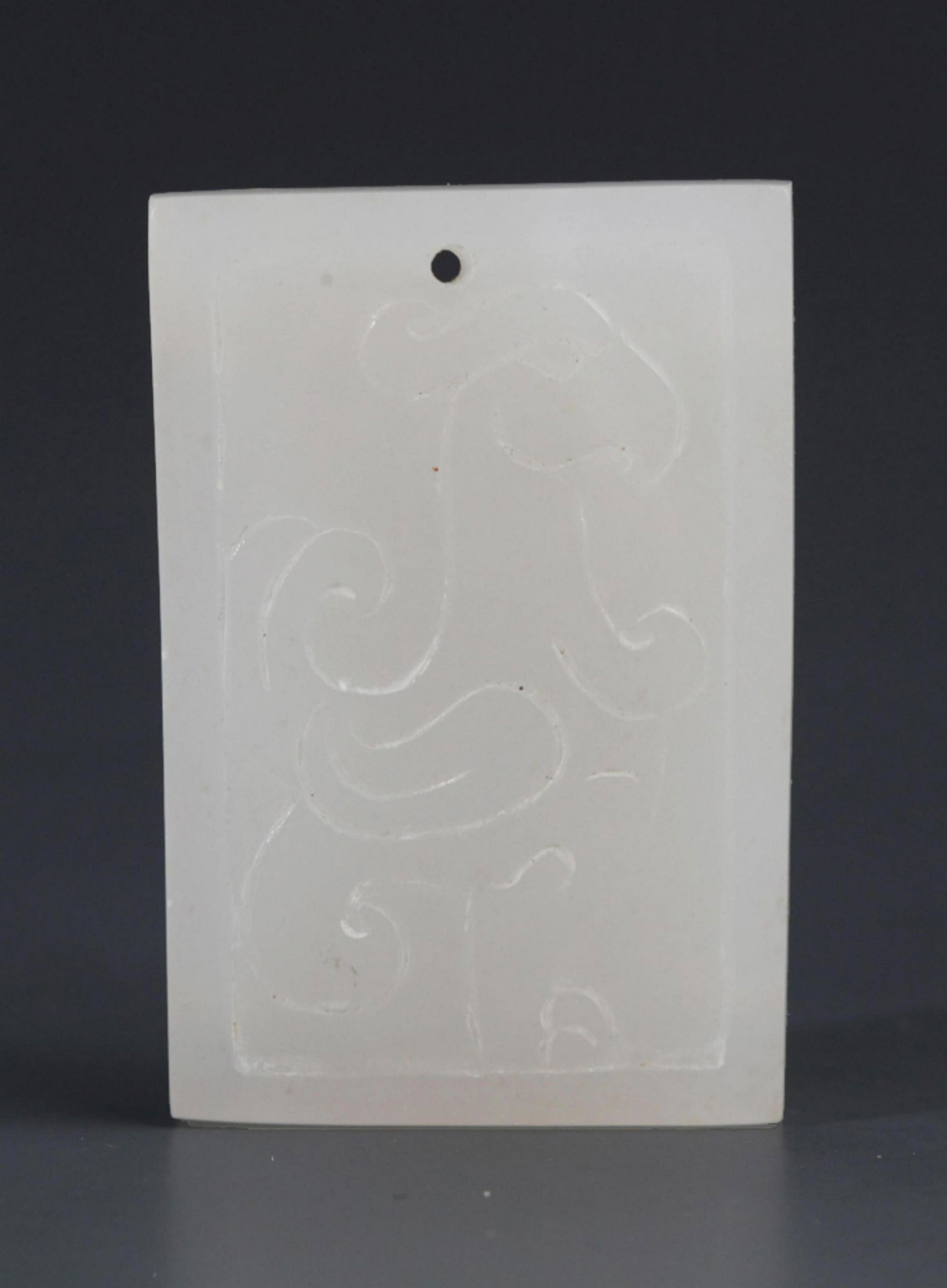 A FINE WHITE JADE PENDANT WITH BIRD CARVING (1 of 3)