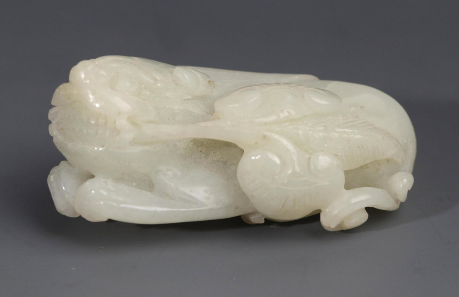 A WHITE JADE PENDANT CARVING RUI SHOU: Republic Period, Long:1.9 inch ; Width:1.1 inch