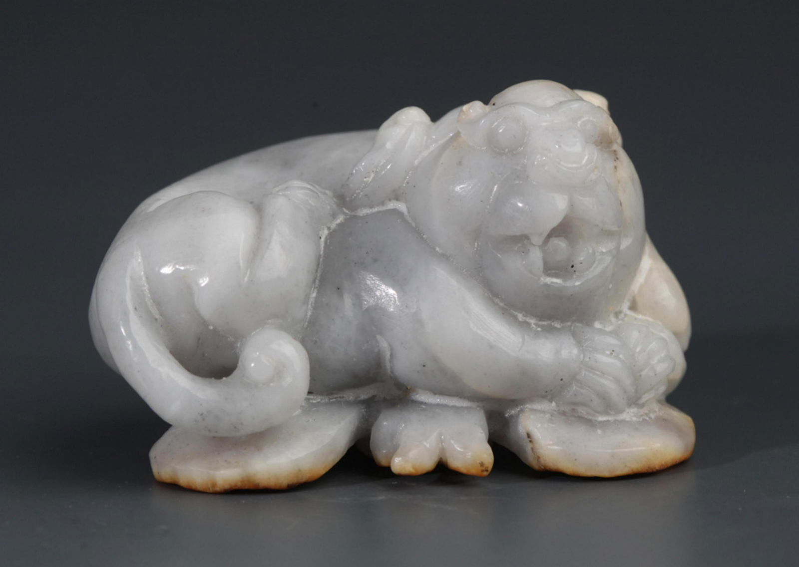 A FINE PALE CELADON JADE RUI SHOU FIGURE PENDANT (1 of 4)