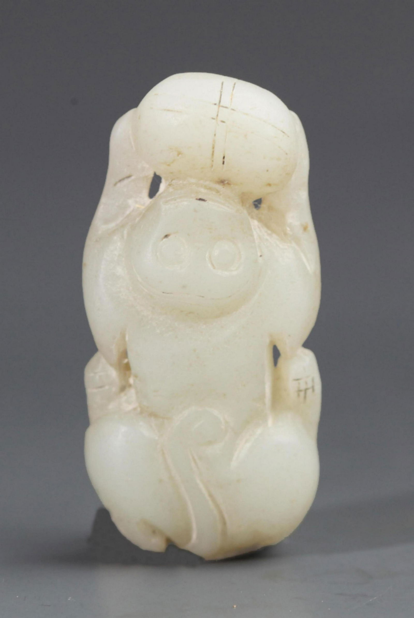 A FINE MONKEY PATTERN GREENISH WHITE JADE PENDANT (1 of 4)