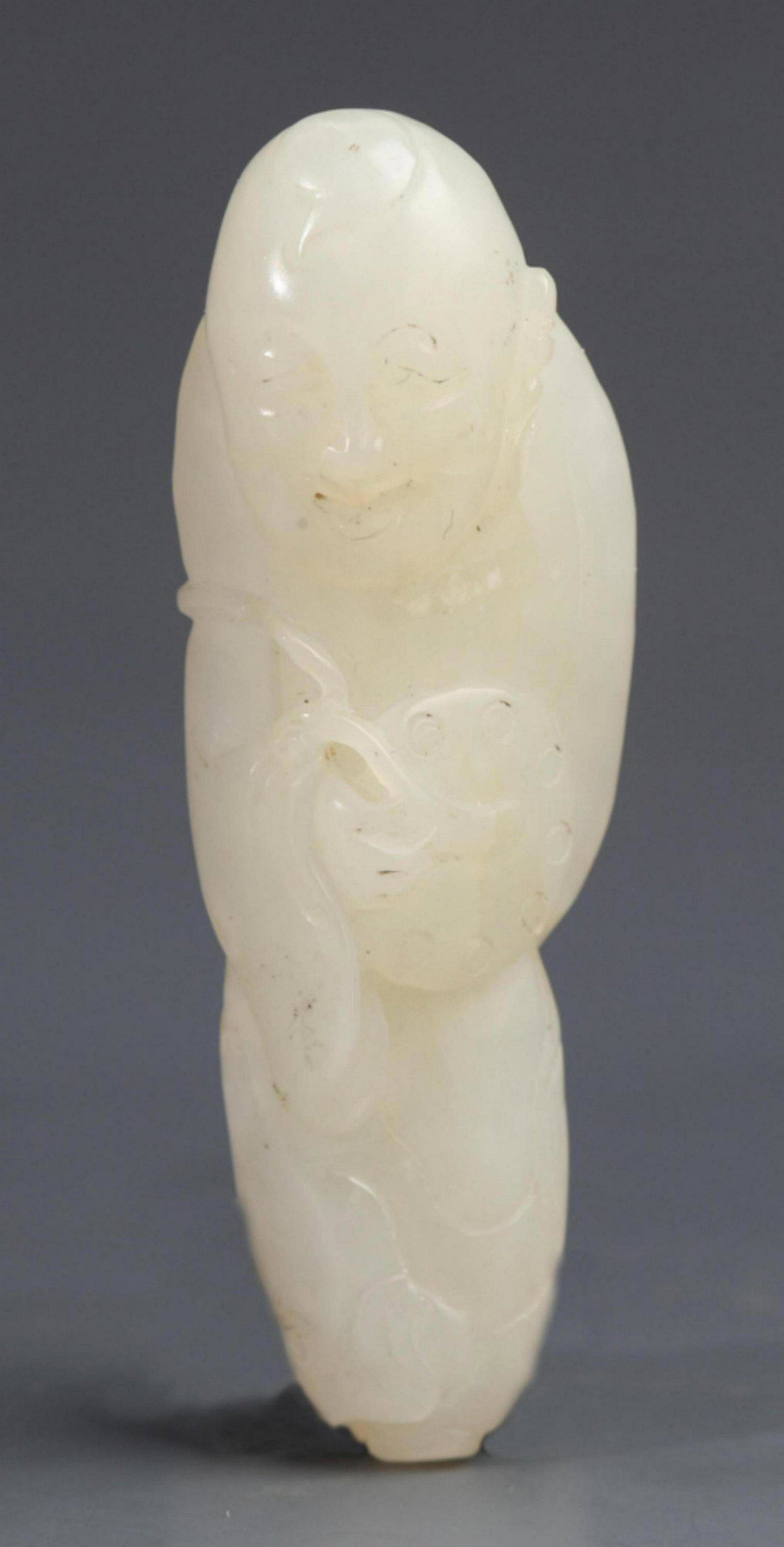 A "ZHONG DAO IMMORTAL" CARVING WHITE JADE PENDANT: 20th Century, Long:2.2 inch ; Width:0.6 inch
