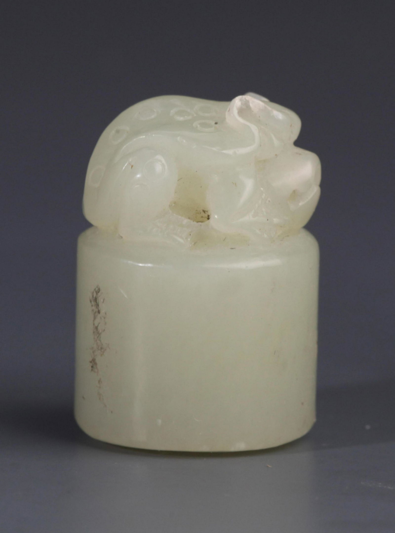 A WHITE JADE "THREE FOOT TOAD" SEAL (1 of 4)