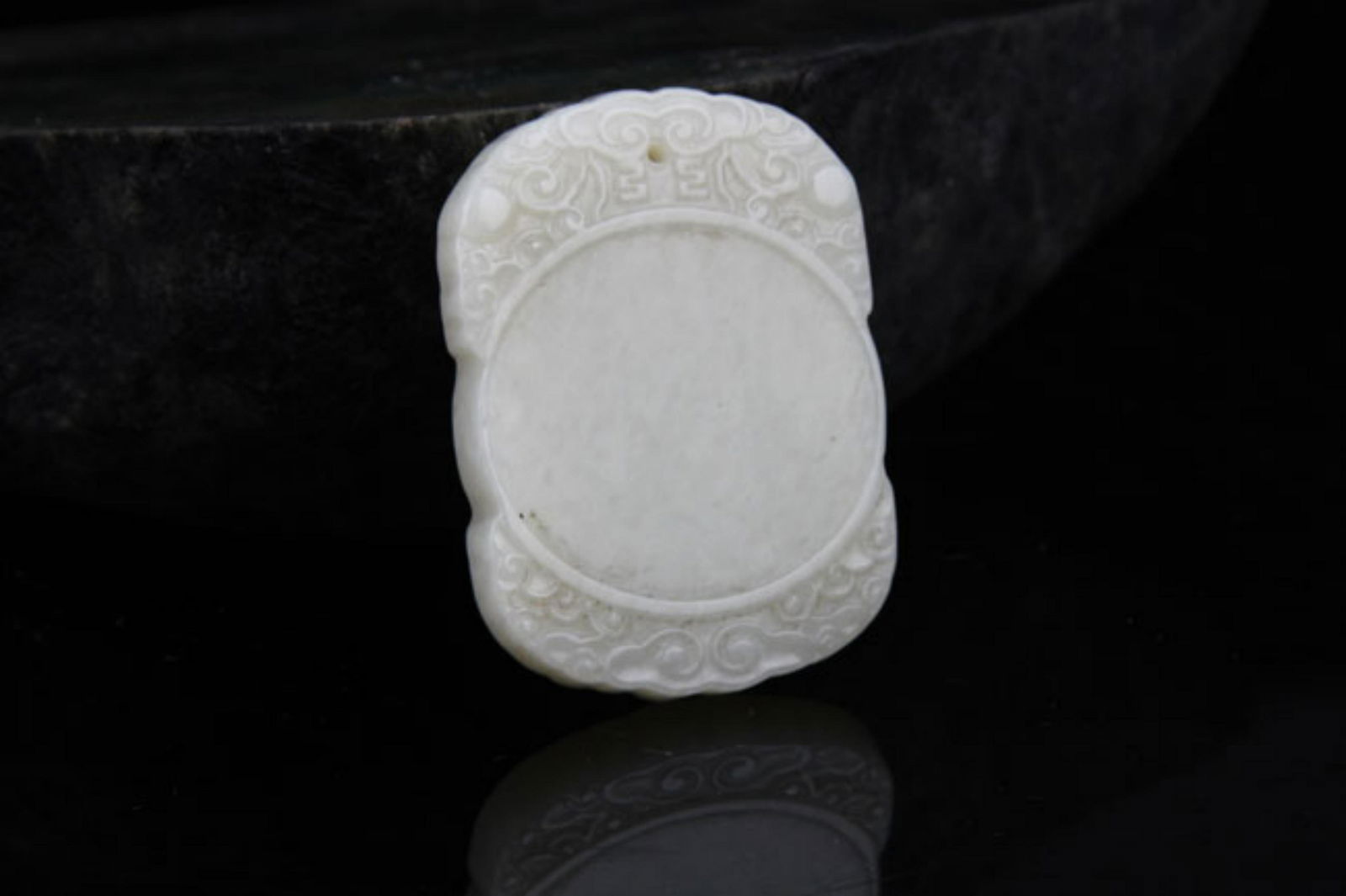 A FINE HE TIAN GREENISH WHITE JADE PLAQUE (1 of 3)