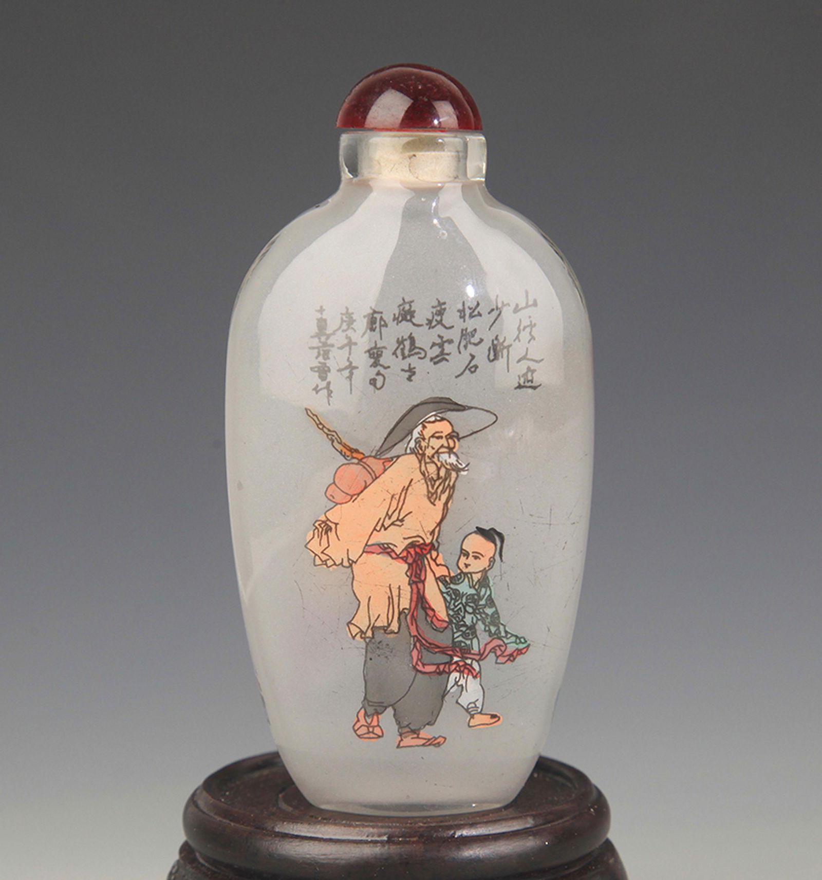 A FINE CHARACTER PAINTED SNUFF BOTTLE (1 of 3)