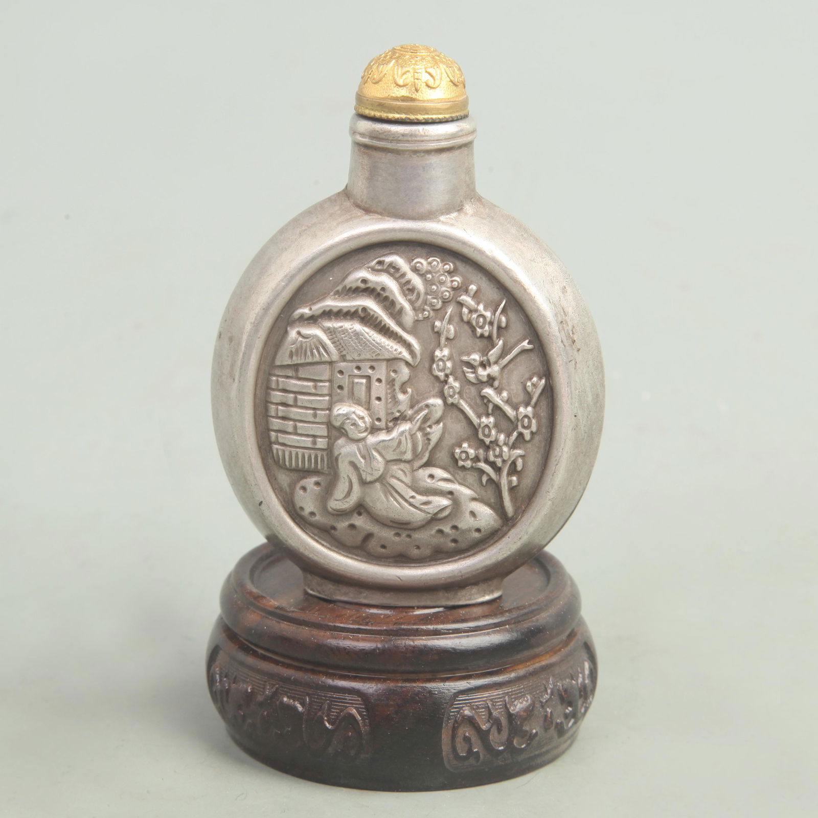 A CHARACTER PATTERN SILVER PLATED SNUFF BOTTLE (1 of 4)
