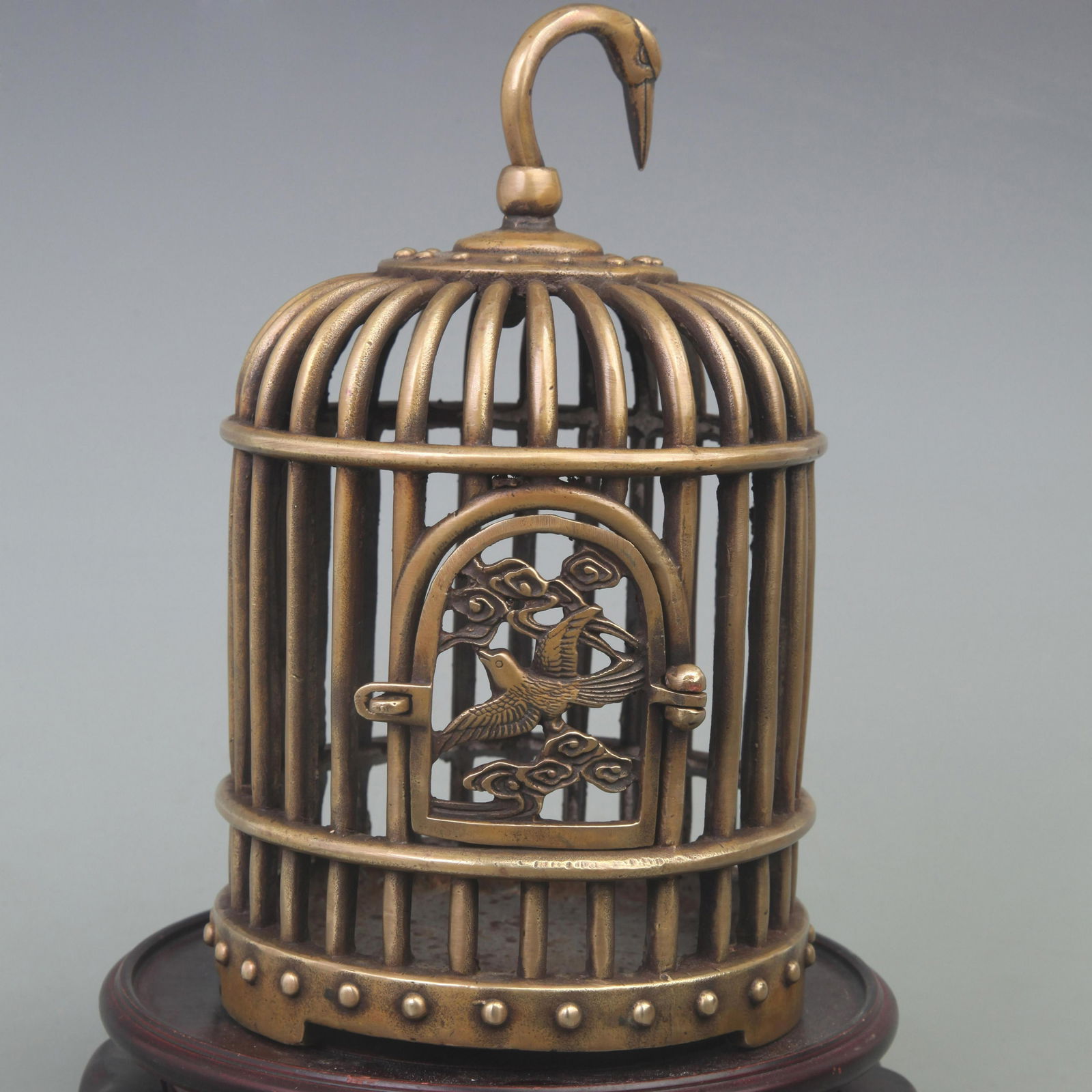 A SMALL BRONZE BIRD CAGE DISPLAY (1 of 7)