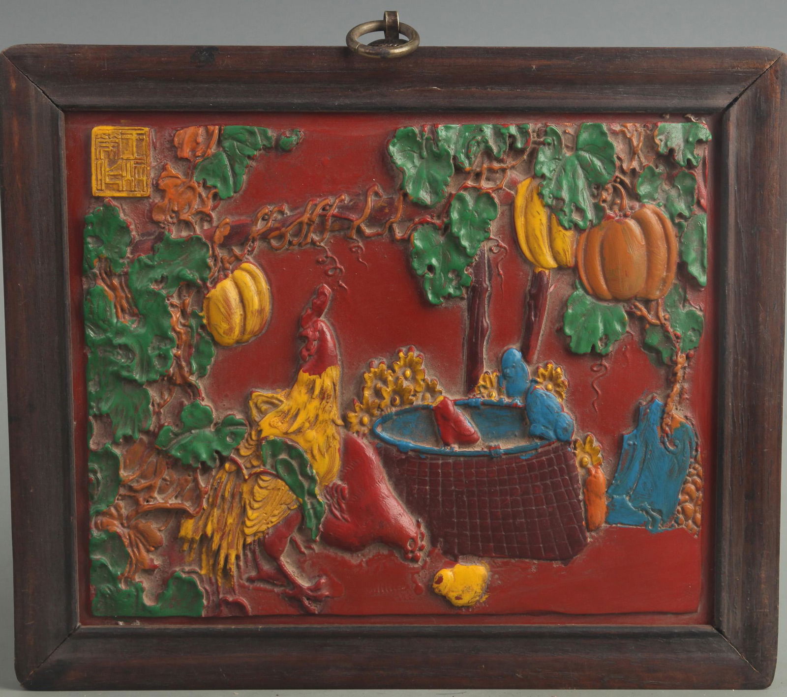 A FINE COLORED RED CARVED LACQUER WALL PLATE (1 of 4)
