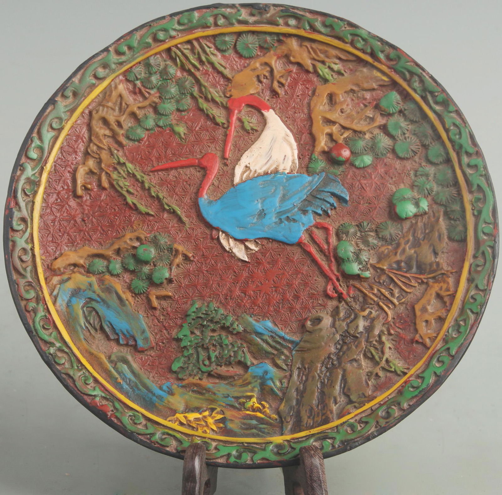 A FINE COLORED RED CARVED LACQUER DRAGON PLATE (1 of 5)