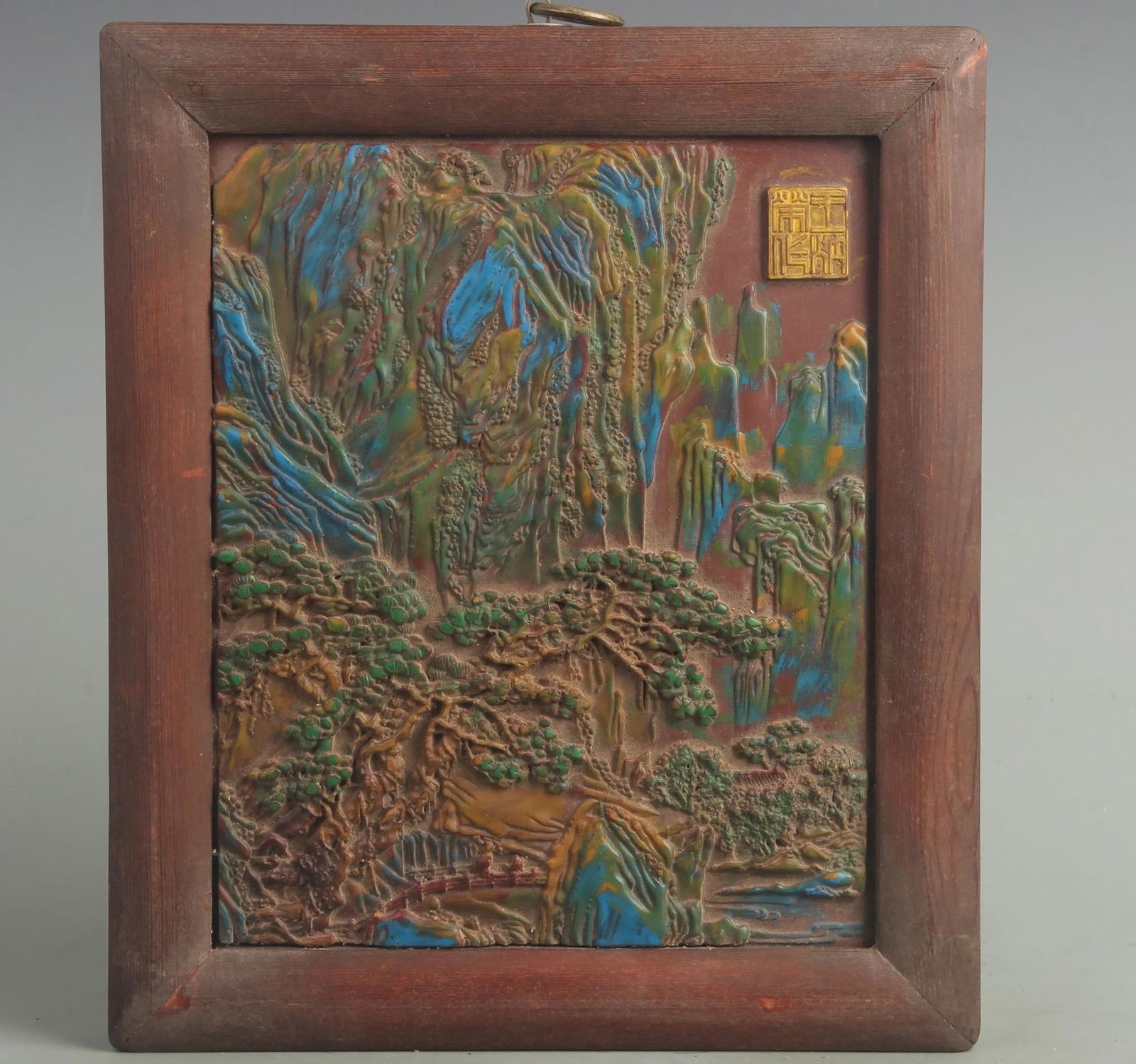 A FINE COLORED RED CARVED LACQUER WALL PLATE (1 of 4)