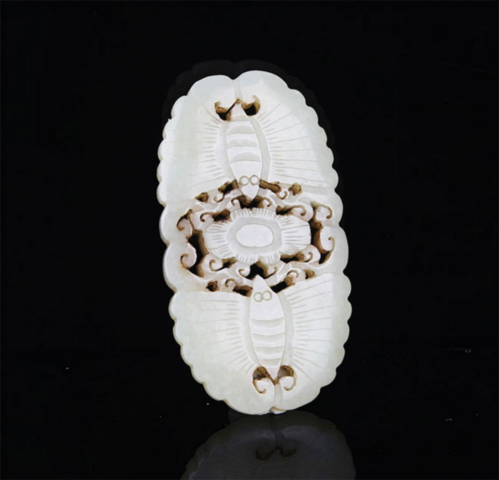 A FINE HE TIAN PALE CELADON JADE PENDANT: Modern; High: 2.8 inch; Width: 1.5 inch