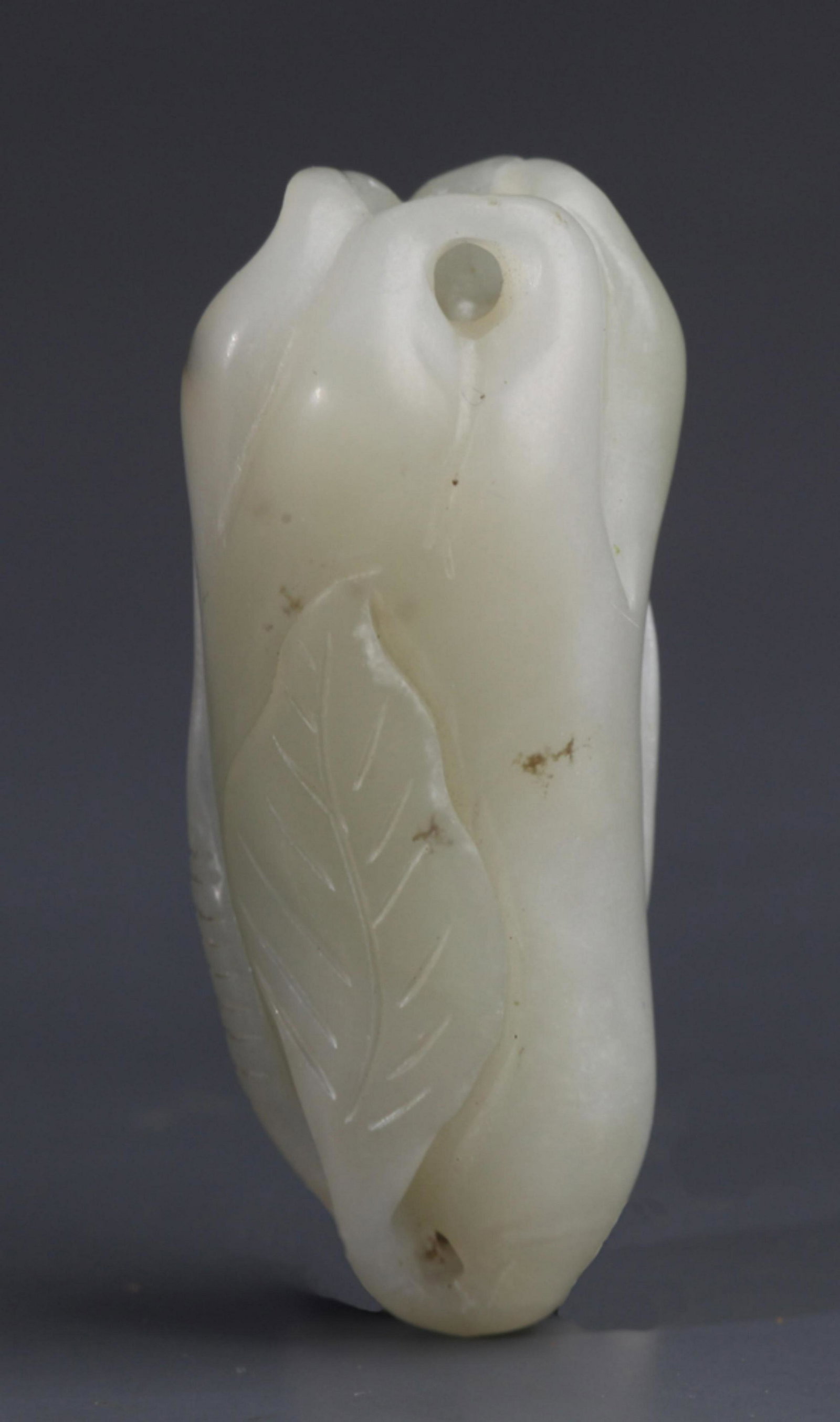 A BUDDHA HAND SHAPED WHITE JADE PENDANT (1 of 4)