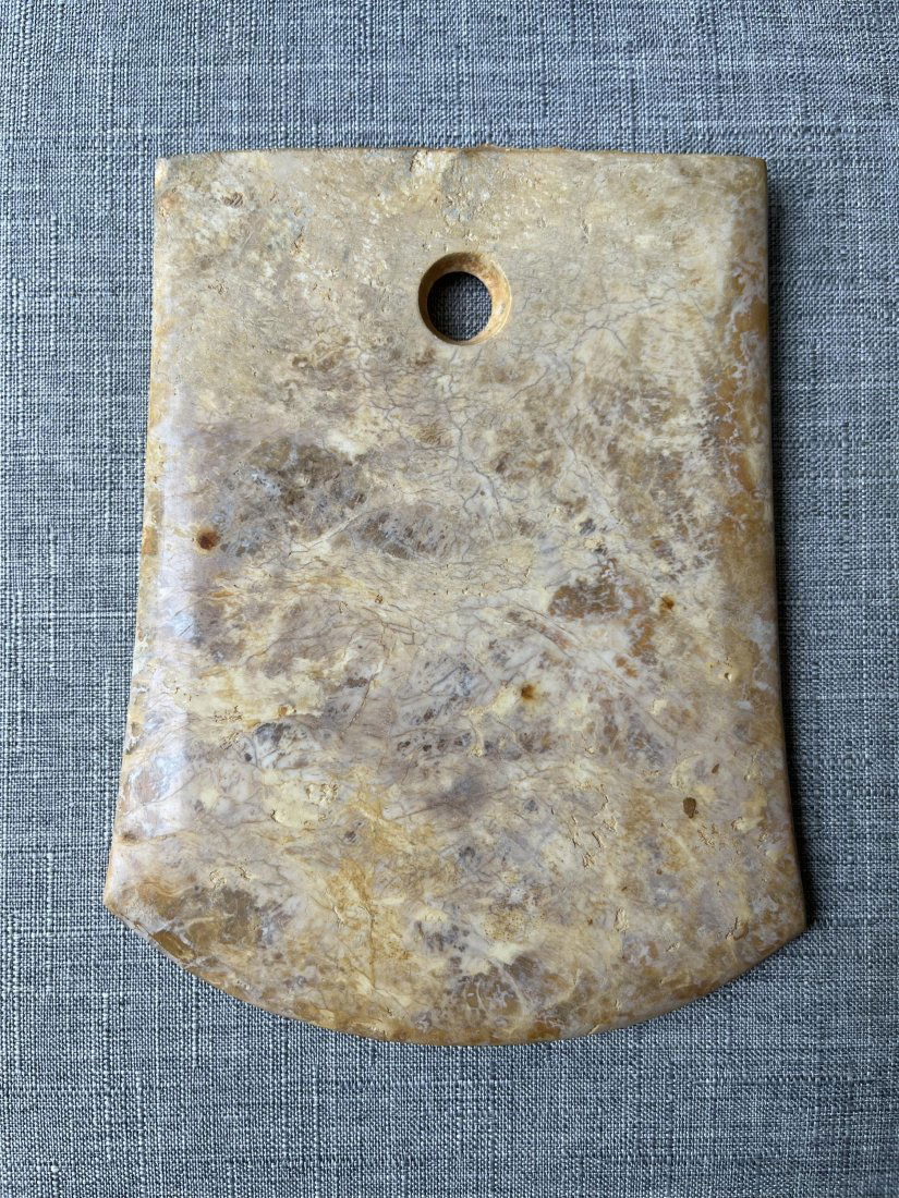 A RARE AXE SHAPED LIANG ZHU CULTURE STYLE JADE (1 of 5)