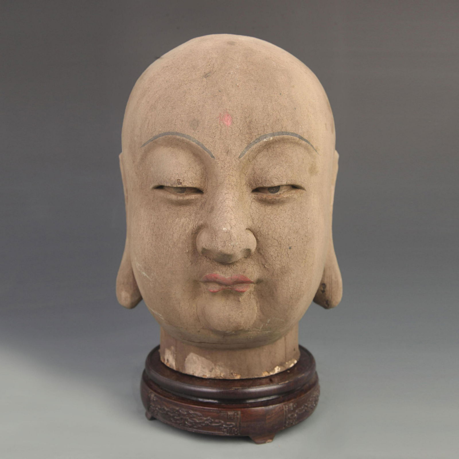 A FINELY PAINTED WOODEN BUDDHA HEAD FIGURE (1 of 5)