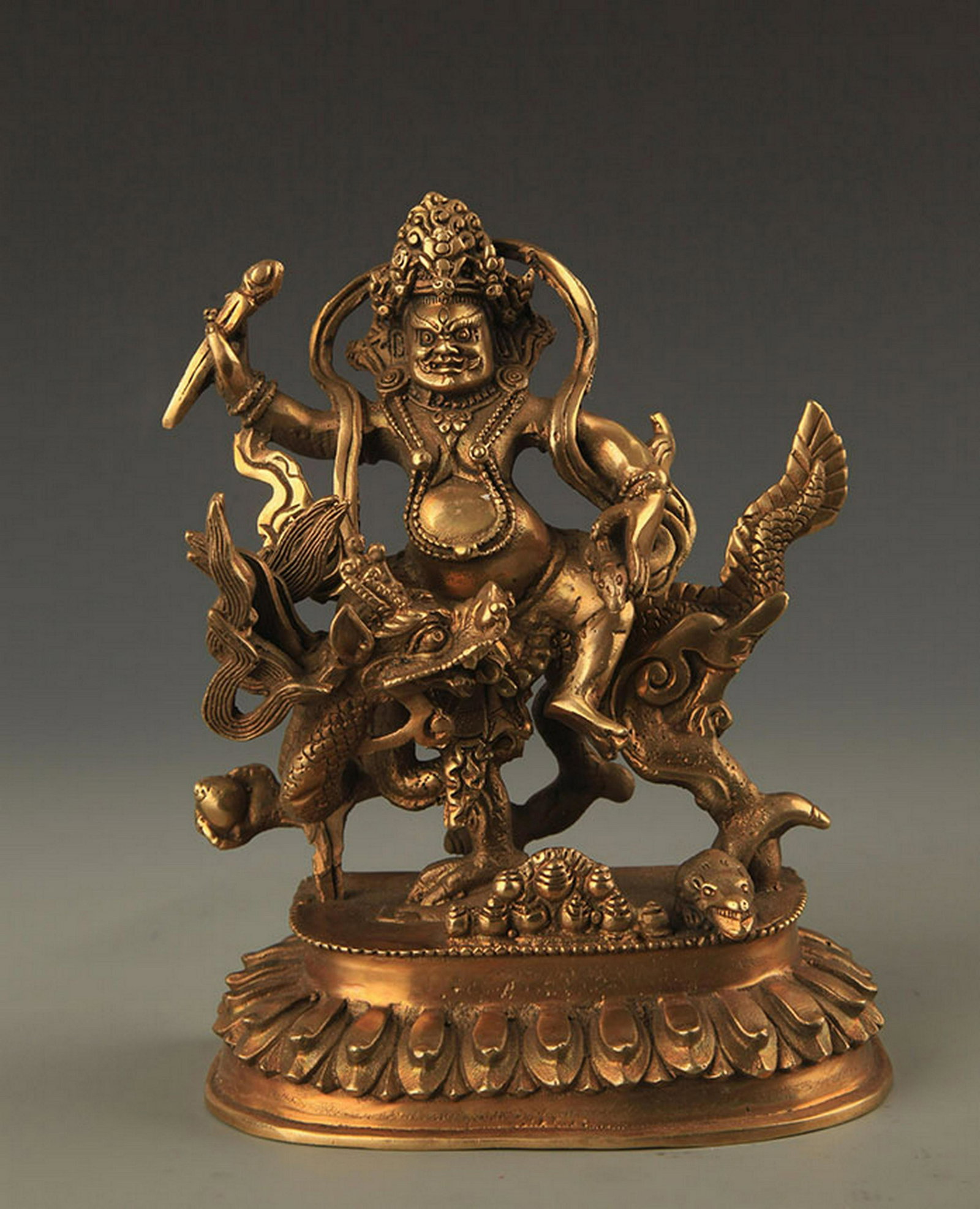 A FINE BRONZE TIBETAN GOD OF WEALTH FIGURE: 20th Century, High: 6.75 inch; Width: 5.25 inch
