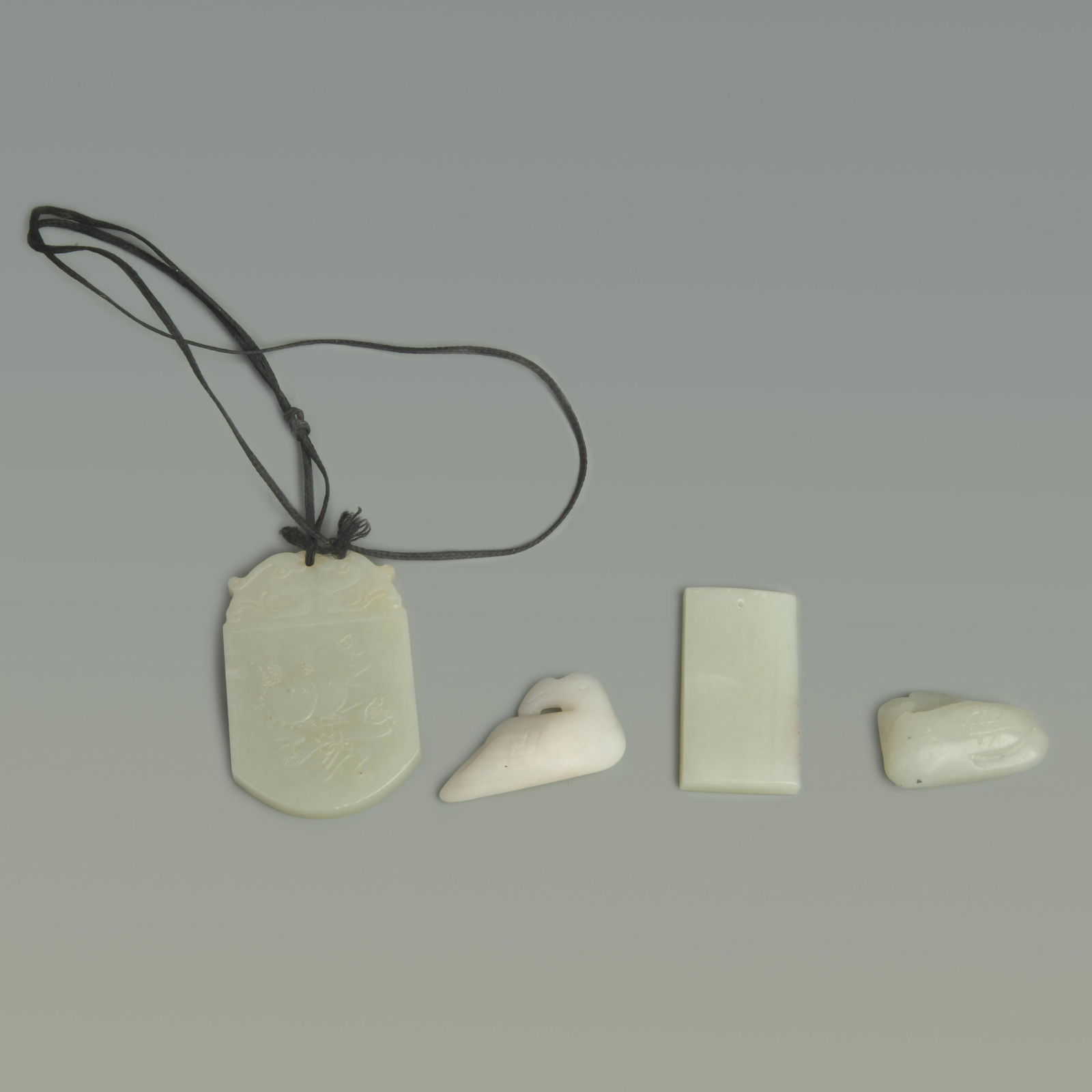 GROUP OF FOUR JADE PENDANT (1 of 14)