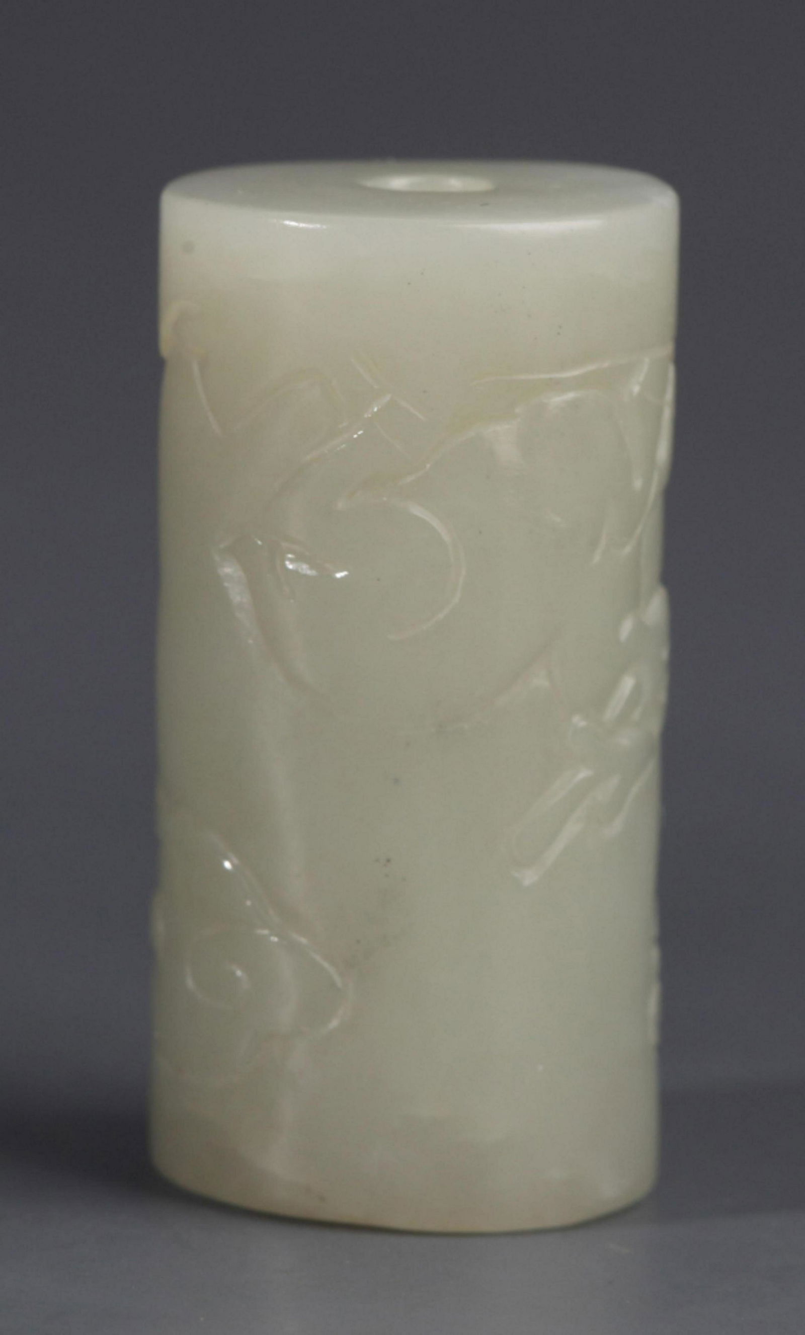 A FINELY CARVED PALE CELADON JADE PENDANT: Modern, High: 0.59 inch