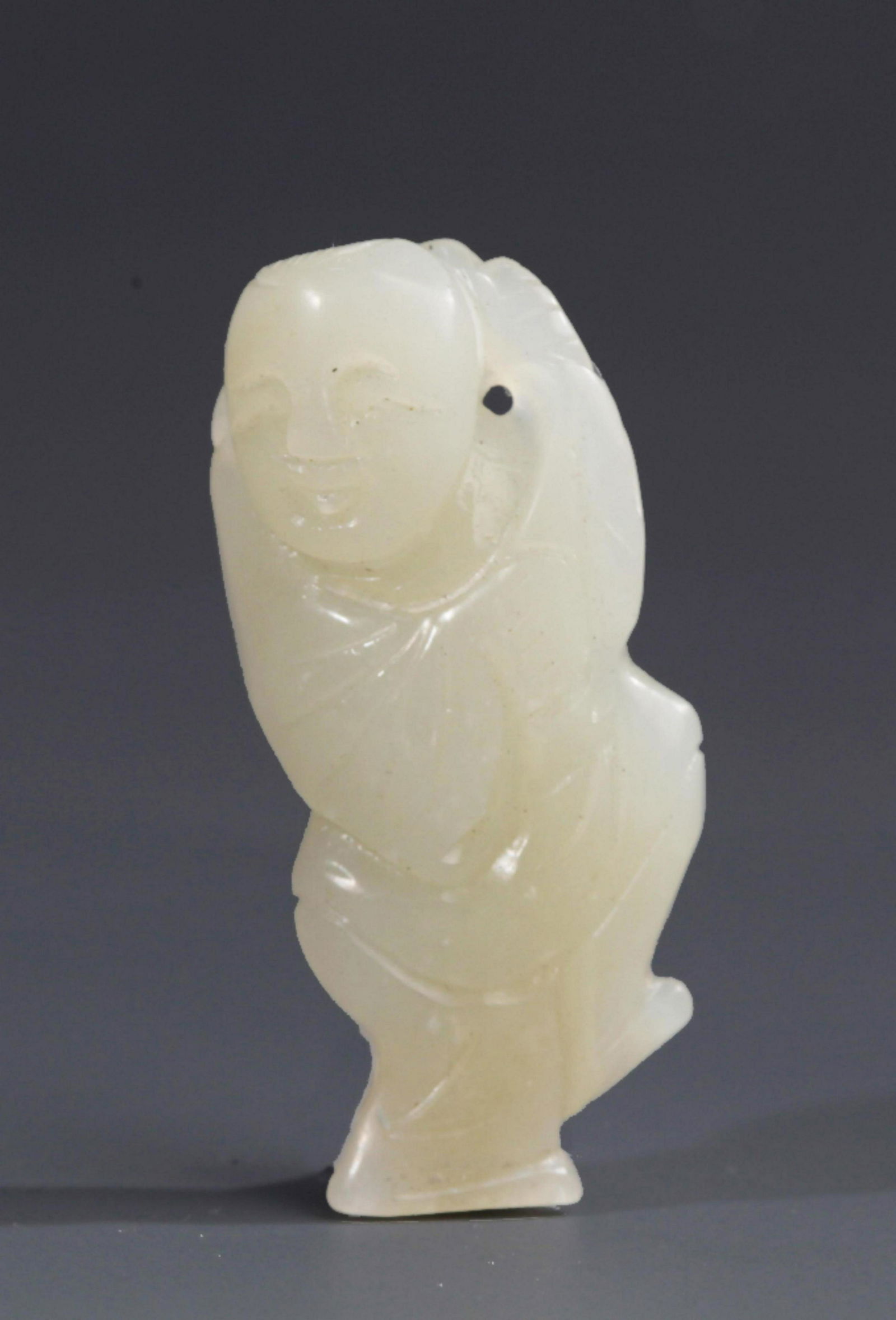 A FINE PALE CELADON JADE BOY PATTERN PENDANT (1 of 3)