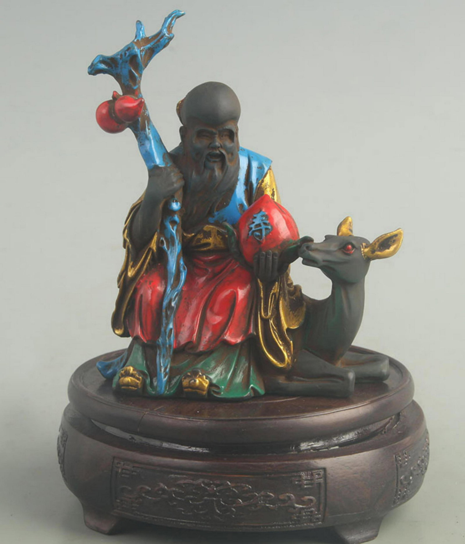 A FINE COLORED GLASS MADE LONGEVITY GOD FIGURE (1 of 5)