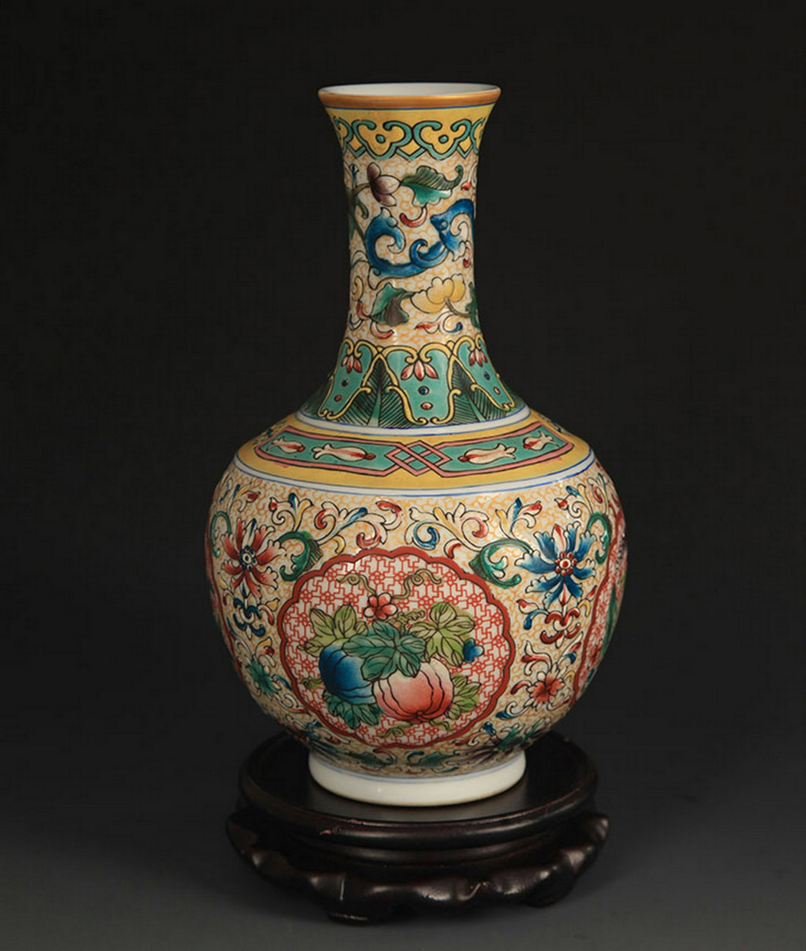 A FAIENCE COLOR LOTUS PATTERN DECORATIVE VASE: Qing Dynasty, High: 9.25 inch; Diameter: 2.25 inch