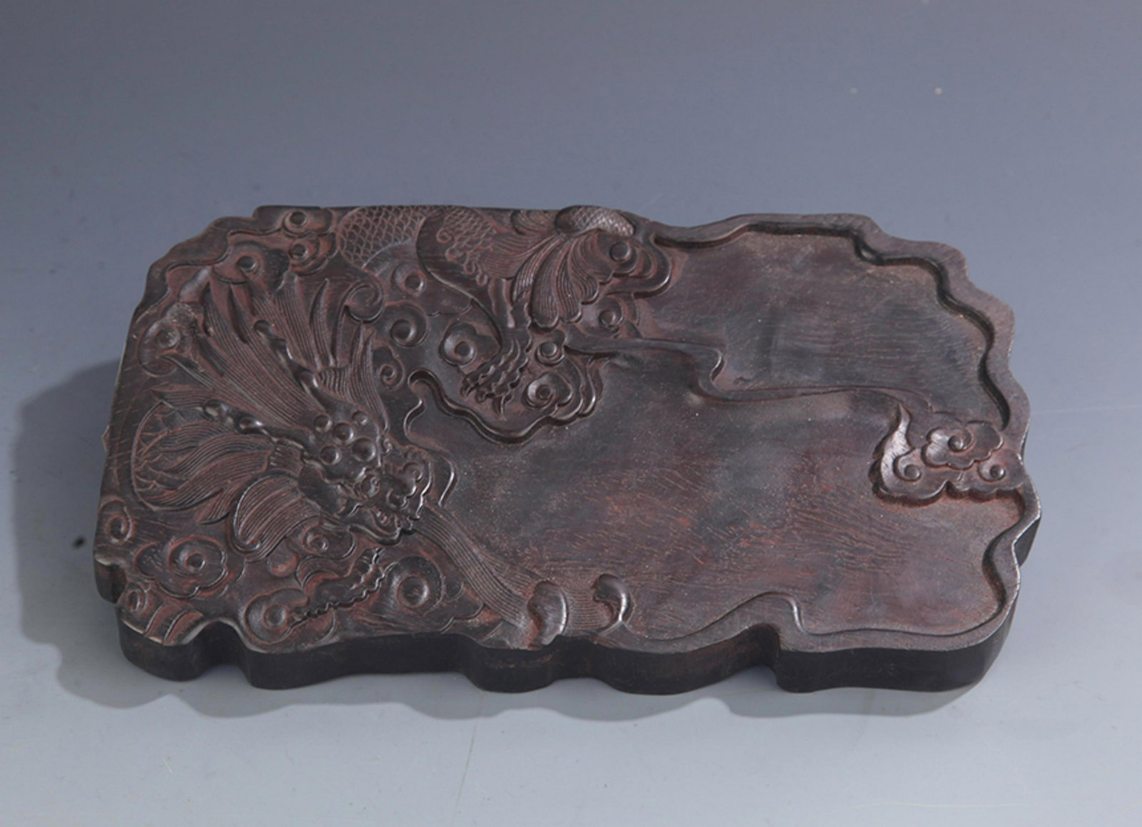 A FINELY CARVED ROSEWOOD BRUSH LICK JAR: 20th Century, High: 0.75 inch; Long: 9.5 inch; Width: 5.5 inch